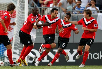 TAMPA, FL - JUNE 11:  Dwayne De Rosario #14 of Team Canada celebrates a goal against Team Guadeloupe during the CONCACAF Gold Cup Match at Raymond James Stadium on June 11, 2011 in Tampa, Florida.  (Photo by J. Meric/Getty Images)