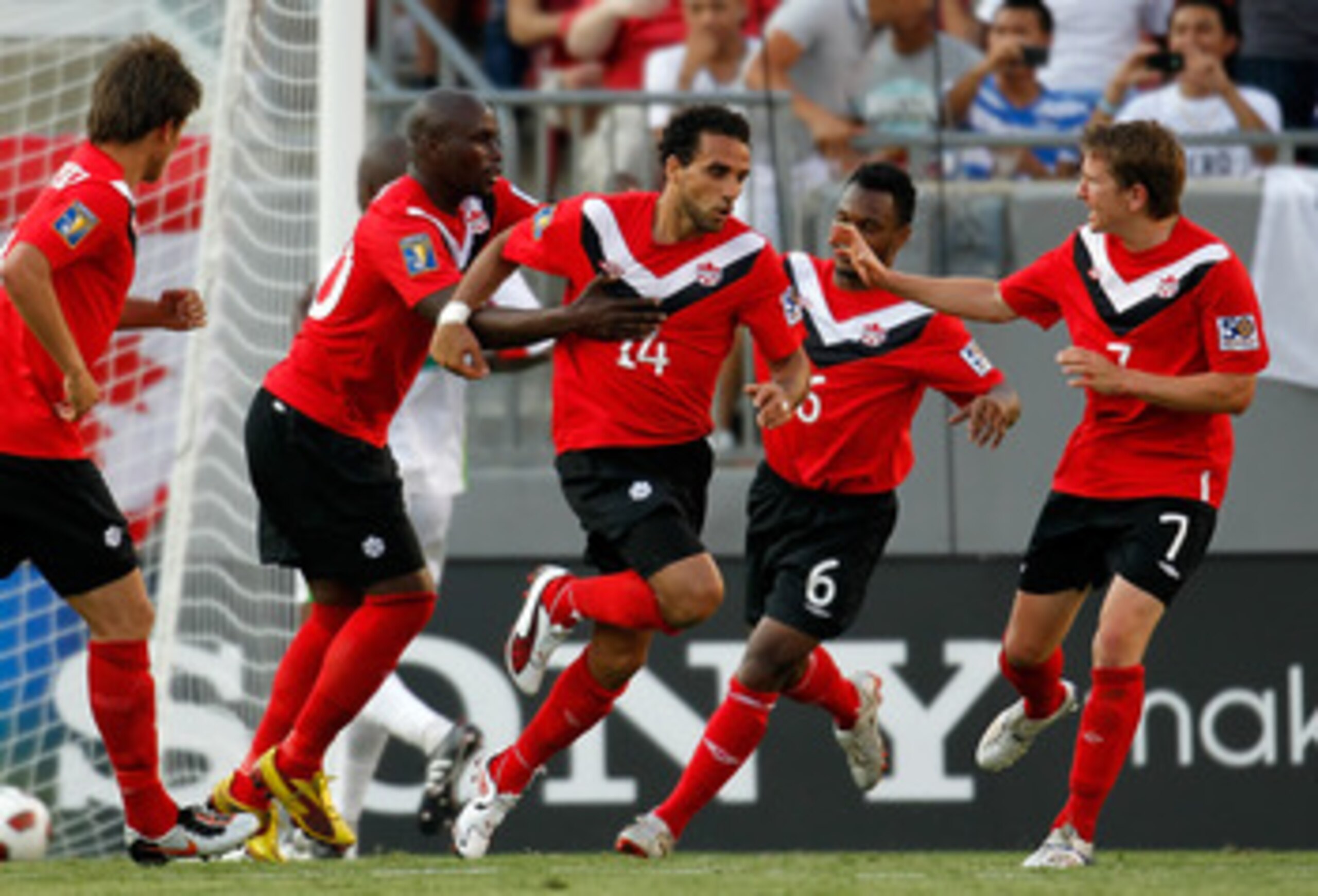 TAMPA, FL - JUNE 11:  Dwayne De Rosario #14 of Team Canada celebrates a goal against Team Guadeloupe during the CONCACAF Gold Cup Match at Raymond James Stadium on June 11, 2011 in Tampa, Florida.  (Photo by J. Meric/Getty Images)