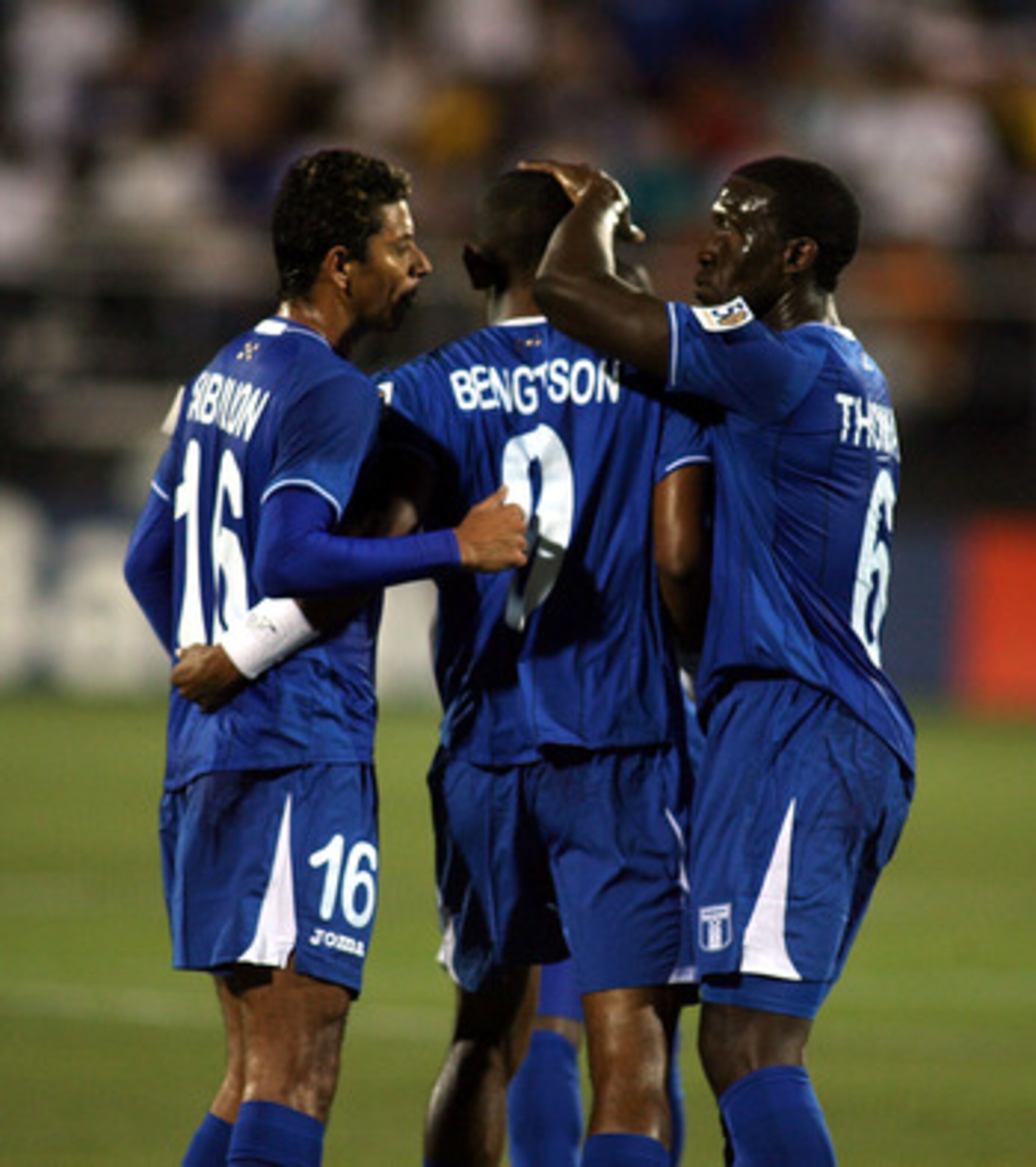 MIAMI, FL - JUNE 10:  Jerry Bengstson #9 of Honduras celebrates a goal against Grenada with teammates at FIU Stadium on June 10, 2011 in Miami, Florida.  (Photo by Marc Serota/Getty Images)