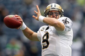 SEATTLE, WA - JANUARY 08:  Quarterback Drew Brees #9 of the New Orleans Saints warms-up before taking on the Seattle Seahawks during the 2011 NFC wild-card playoff game at Qwest Field on January 8, 2011 in Seattle, Washington.  (Photo by Jonathan Ferrey/G