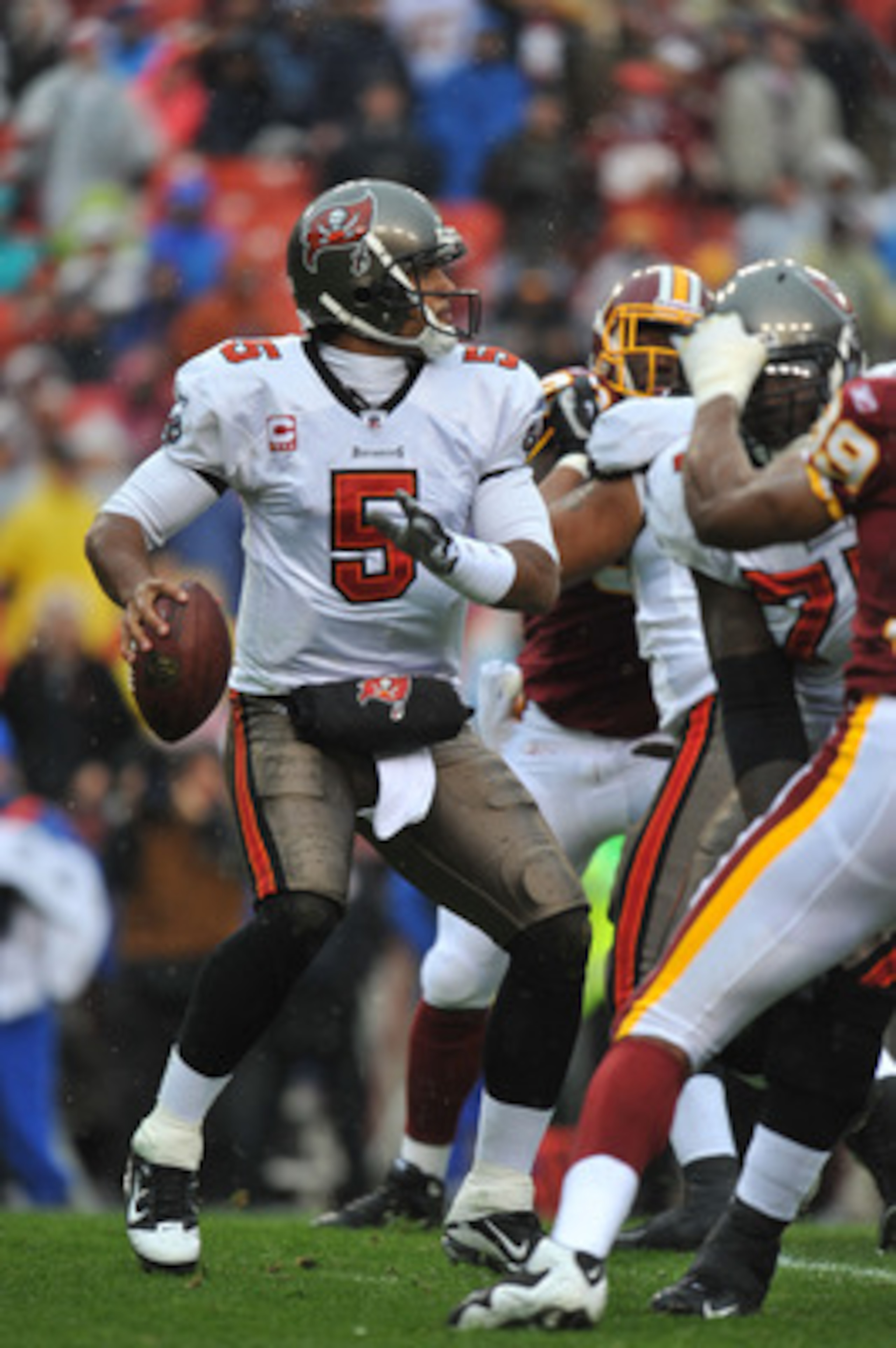 LANDOVER, MD - DECEMBER 12:  Josh Freeman #5 of the Tampa Bay Buccaneers passes during the game against the Washington Redskins  at FedExField on December 12, 2010 in Landover, Maryland. The Buccaneers defeated the Redskins 17-16. (Photo by Larry French/G