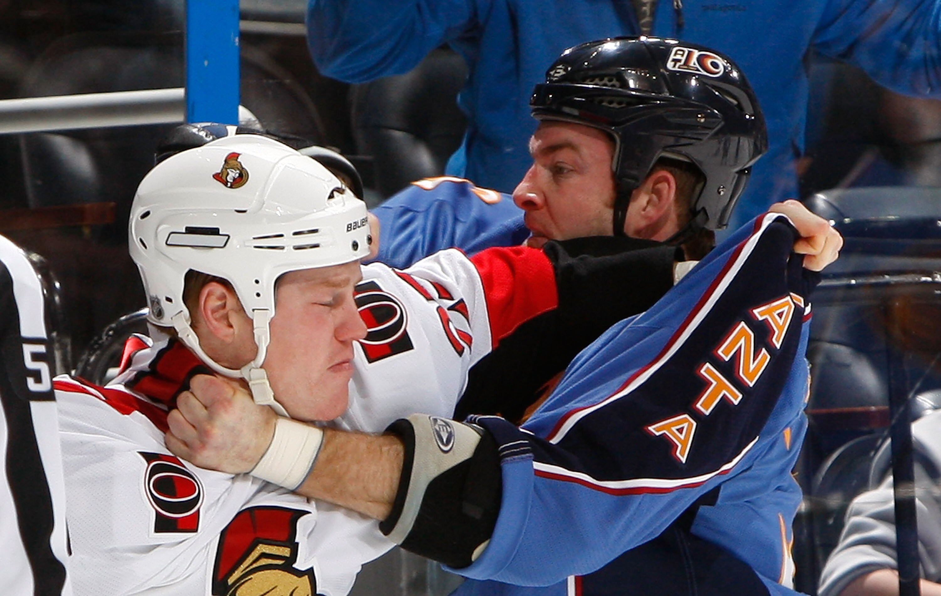 ATLANTA - JANUARY 12:  Chris Neil #25 of the Ottawa Senators fights with Eric Boulton #36 of the Atlanta Thrashers at Philips Arena on January 12, 2010 in Atlanta, Georgia.  (Photo by Kevin C. Cox/Getty Images)