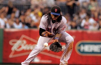 PITTSBURGH, PA - JUNE 10:  Jose Reyes #7 of the New York Mets fields a ground ball against the Pittsburgh Pirates during the game on June 10, 2011 at PNC Park in Pittsburgh, Pennsylvania.  (Photo by Justin K. Aller/Getty Images)