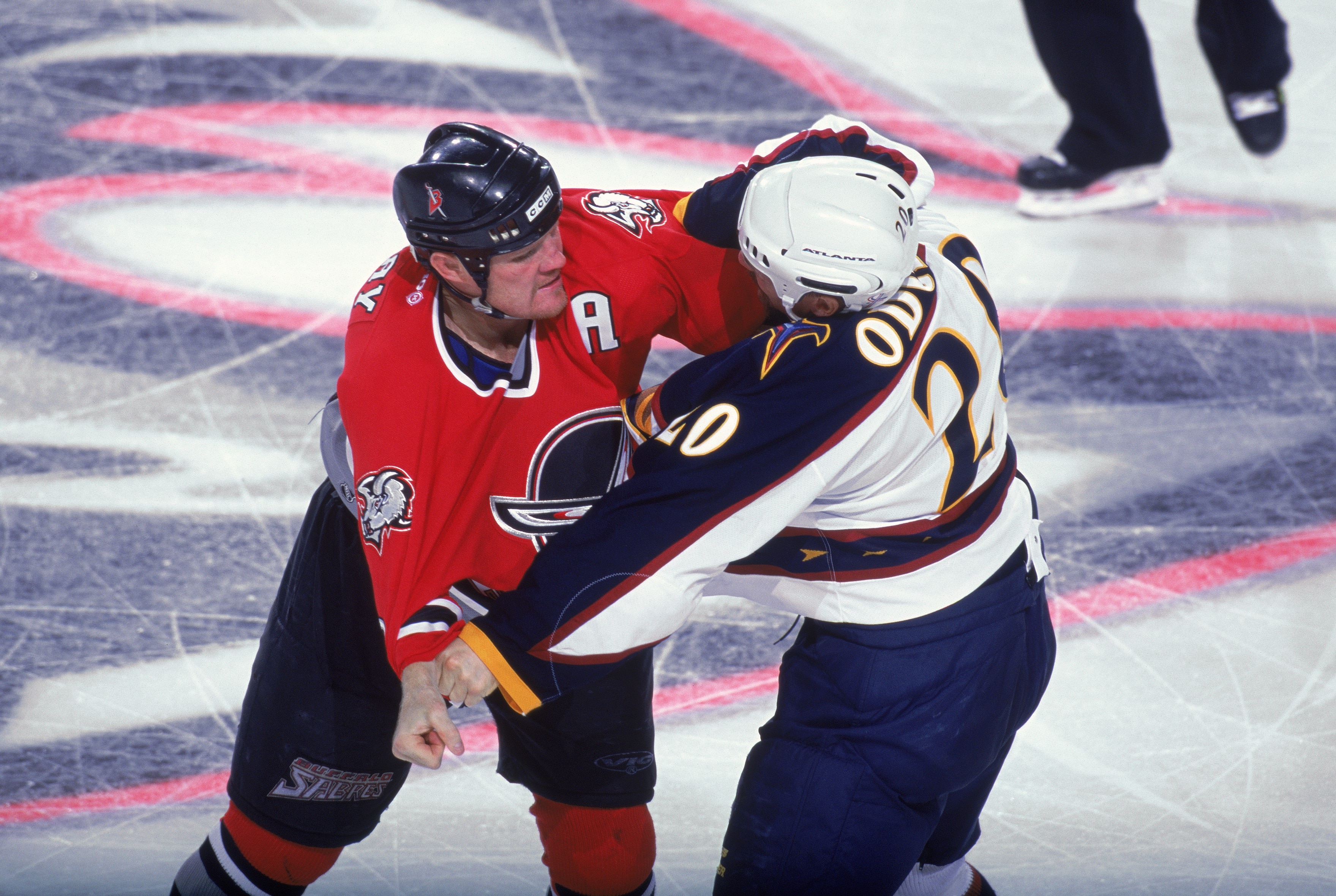 4 Oct 2001:  Rob Ray #32 of the Buffalo Sabres goes head to head against Jeff Odgers #20 of the Atlanta Thrashers during the game at HSBC Arena in Buffalo, New York. The Thrashers defeated the Sabres 2-1. Mandatory Credit: Rick Stewart  /Allsport