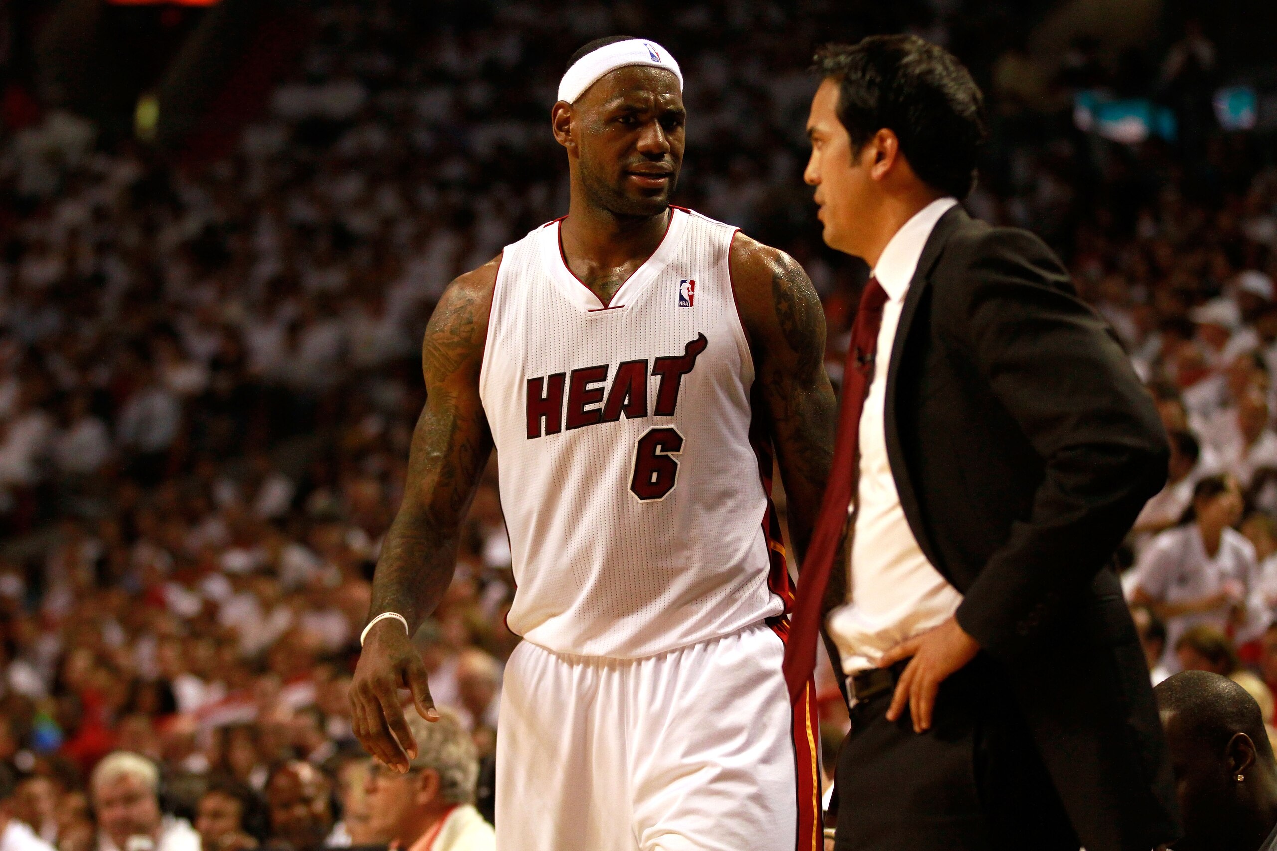 MIAMI, FL - MAY 24:  LeBron James #6 and head coach Erik Spoelstra of the Miami Heat talk against the Chicago Bulls in Game Four of the Eastern Conference Finals during the 2011 NBA Playoffs on May 24, 2011 at American Airlines Arena in Miami, Florida. Th