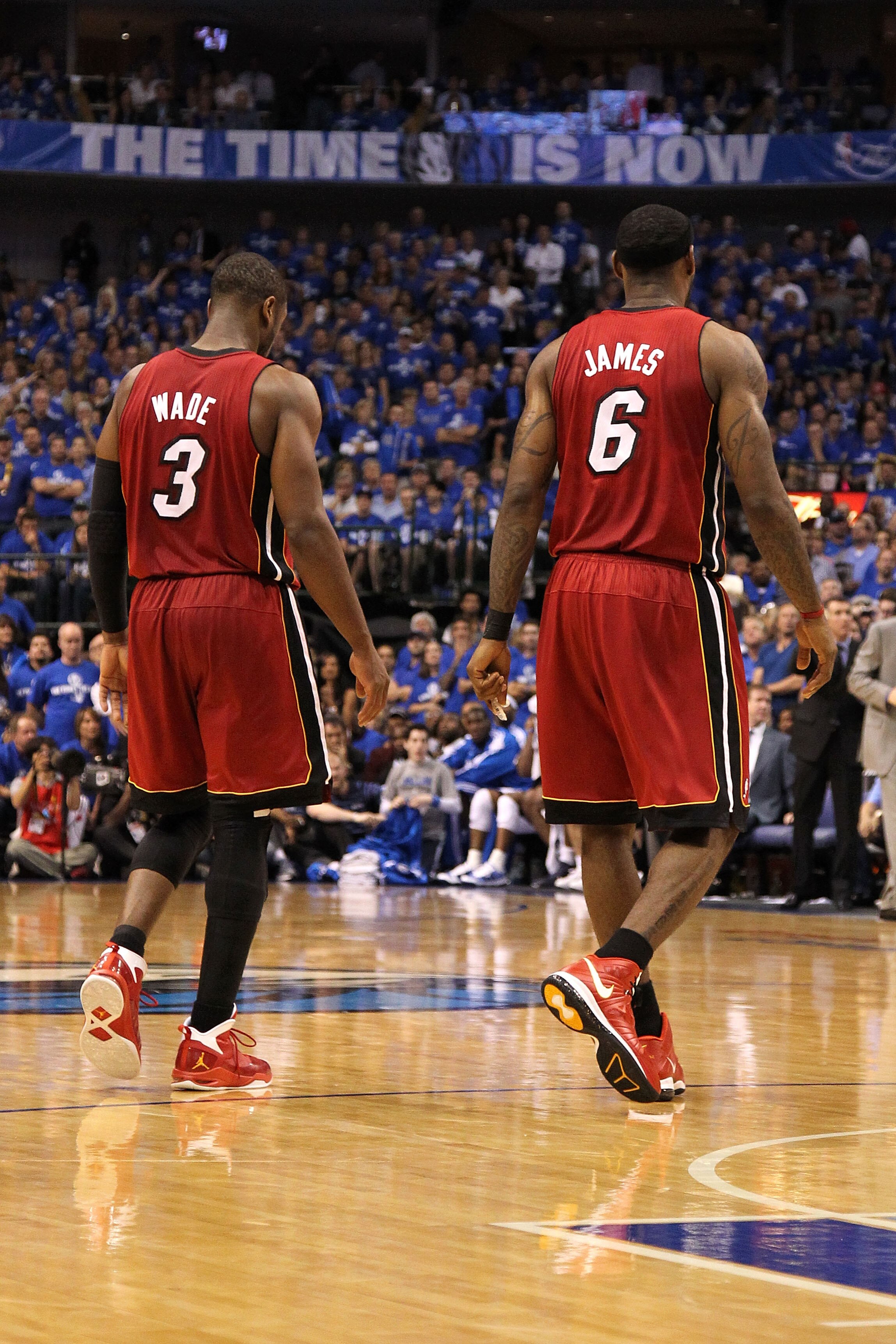 DALLAS, TX - JUNE 07:  (L-R) Dwyane Wade #3 and LeBron James #6 of the Miami Heat walk towards the bench against the Dallas Mavericks in Game Four of the 2011 NBA Finals at American Airlines Center on June 7, 2011 in Dallas, Texas. The Mavericks won 86-83