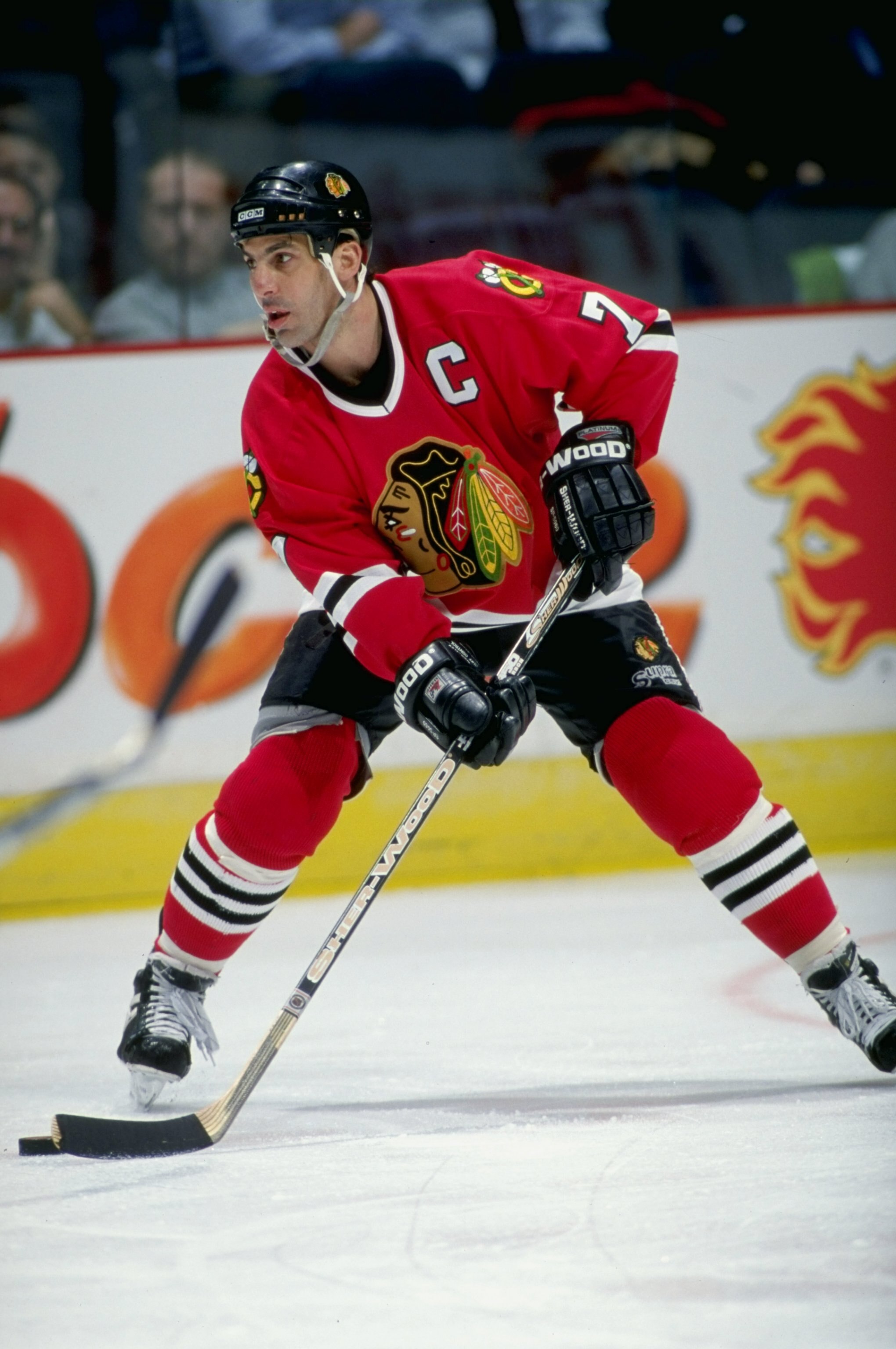 28 Jan 1999:  Chris Chelios #7 of the Chicago Blackhawks controls the puck during the game against the Calgary Flames at the Canadian Airlines Saddledome in Calgary, Alberta, Canada. The Blackhawks tied the Flames 6-6. Mandatory Credit: Ian Tomlinson  /Al