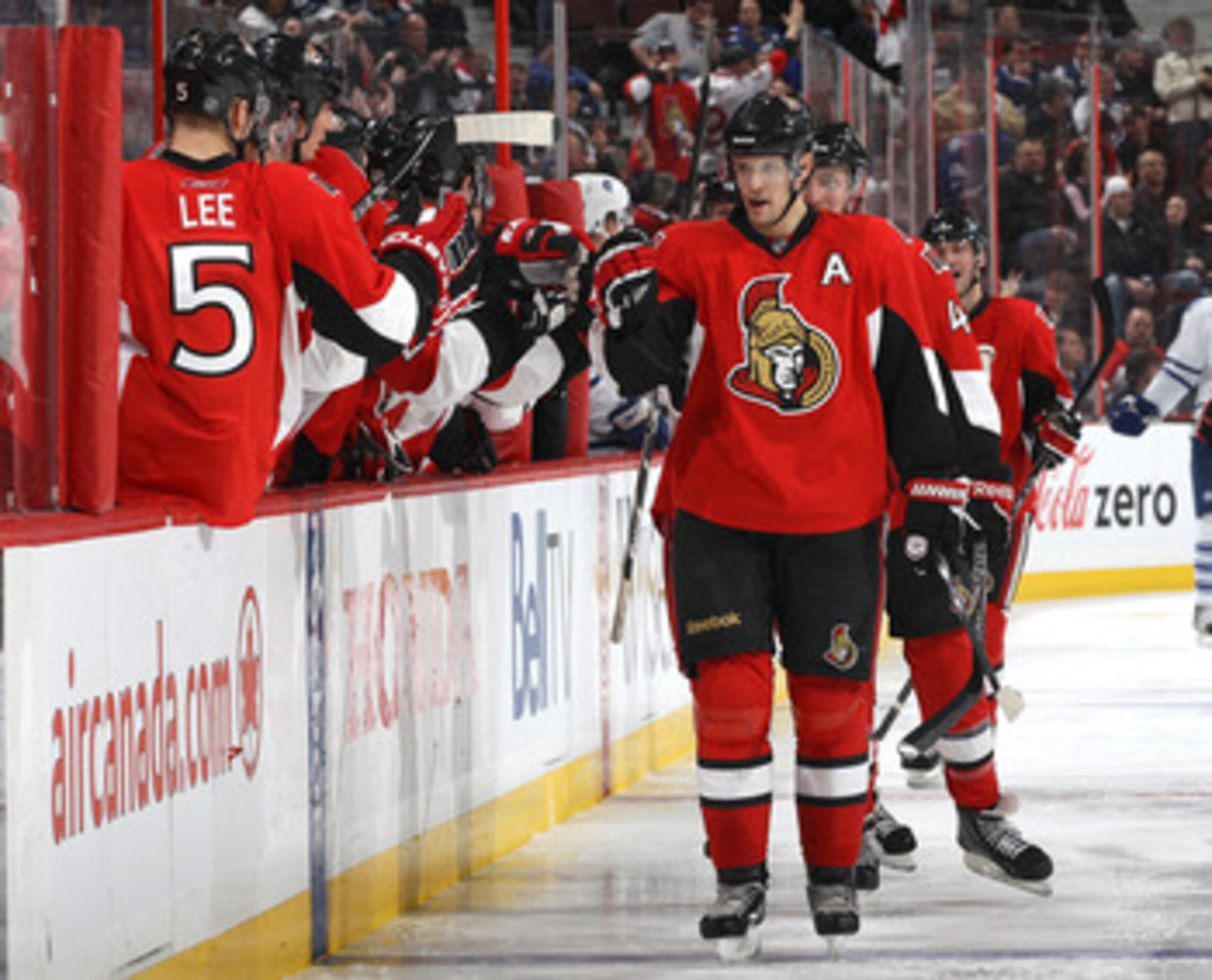 OTTAWA, CANADA - APRIL 2: Jason Spezza #19 of the Ottawa Senators celebrates his second goal of the game with team mate Brian Lee #5 against the Toronto Maple Leafs at Scotiabank Place on April 2, 2011 in Ottawa, Ontario, Canada. (Photo by Jana Chytilova OTTAWA, CANADA - APRIL 2: Jason Spezza #19 of the Ottawa Senators celebrates his second goal of the game with team mate Brian Lee #5 against the Toronto Maple Leafs at Scotiabank Place on April 2, 2011 in Ottawa, Ontario, Canada. (Photo by Jana Chytilova