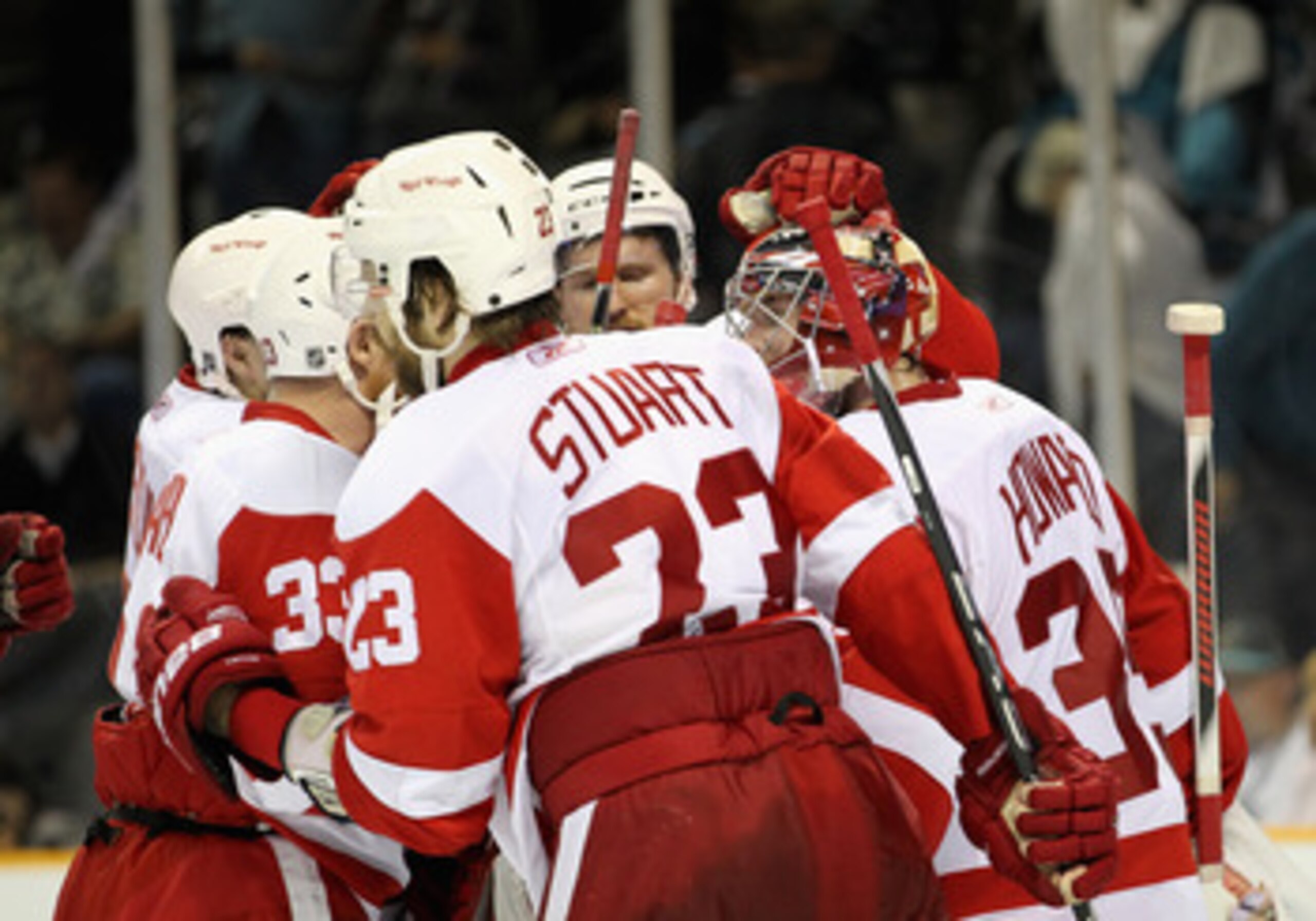 SAN JOSE, CA - MAY 08: Jimmy Howard #35 of the Detroit Red Wings is congratulated by teammates after they beat the San Jose Sharks in Game Five of the Western Conference Semifinals during the 2011 NHL Stanley Cup Playoffs at HP Pavilion on May 8, 2011 in SAN JOSE, CA - MAY 08: Jimmy Howard #35 of the Detroit Red Wings is congratulated by teammates after they beat the San Jose Sharks in Game Five of the Western Conference Semifinals during the 2011 NHL Stanley Cup Playoffs at HP Pavilion on May 8, 2011 in