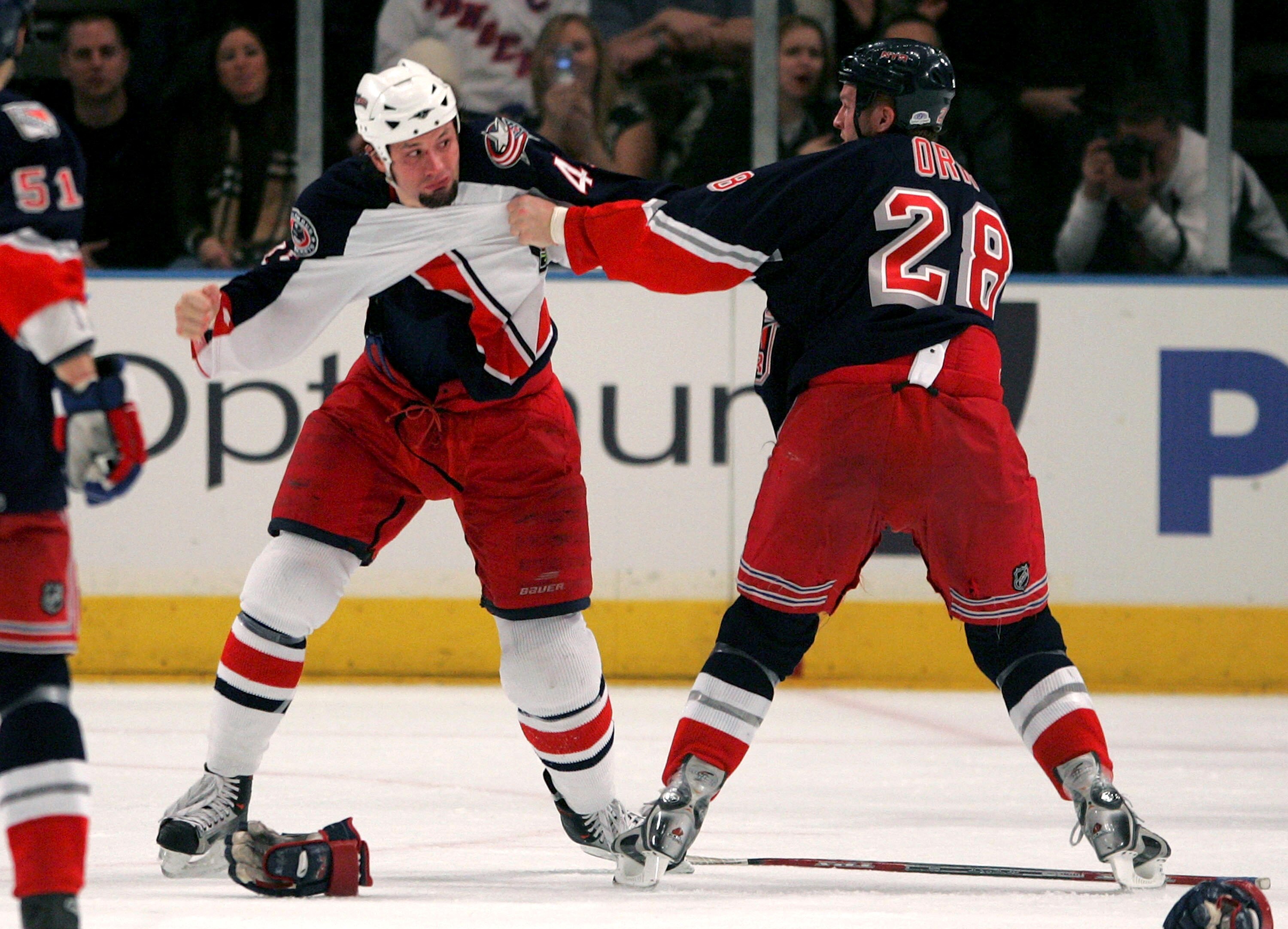 NEW YORK - FEBRUARY 24:  Jody Shelley #45 of the Columbus Blue Jackets and Colton Orr #28 of the New York Rangers exchange blows on February 24, 2007 at Madison Square Garden in New York. The Blue Jackets defeated the Rangers 3-2. (Photo by Bruce Bennett/
