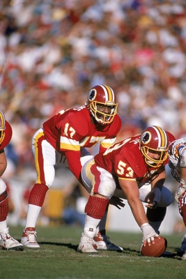 TEMPE, AZ - DECEMBER 3:  Quarterback Doug Williams #17 of the Washington Redskins calls a play at the line of Scrimmage against the Arizona Cardinals during a game at Sun Devil Stadium on December 3, 1989 in Tempe, Arizona.  The Redskins won 29-10.   (Pho