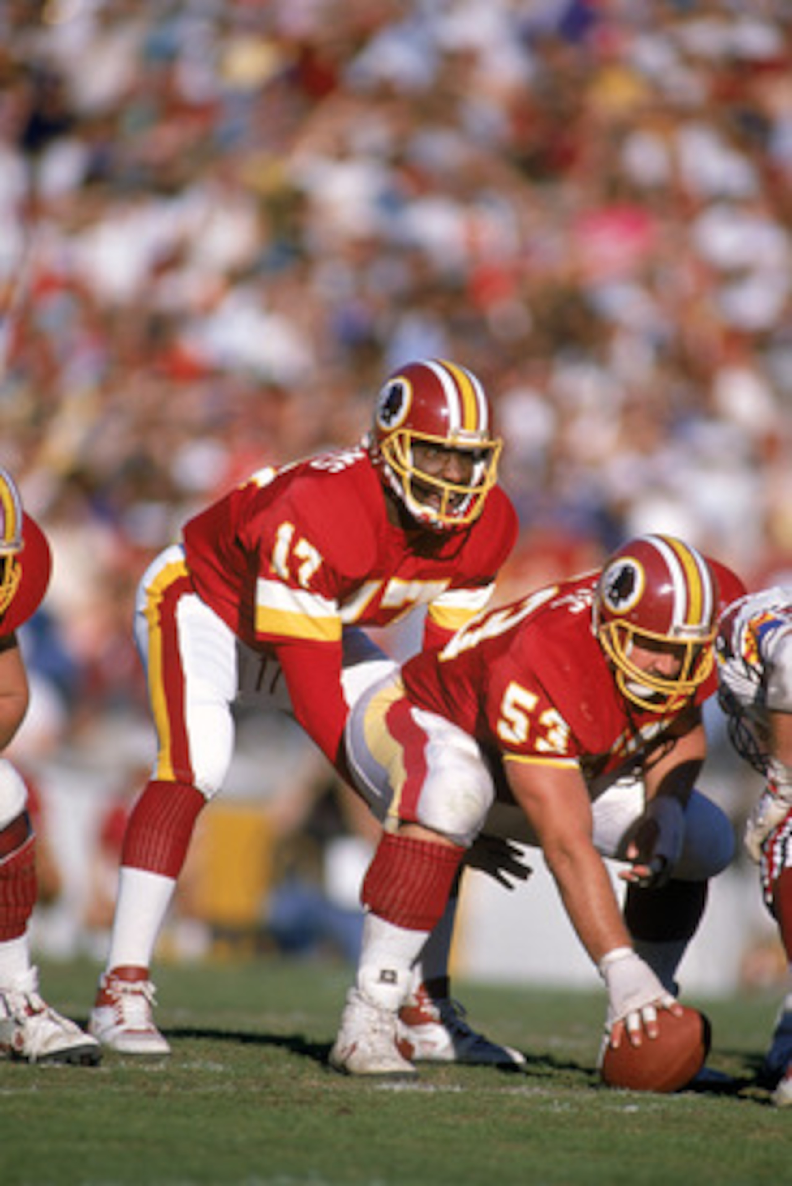 TEMPE, AZ - DECEMBER 3:  Quarterback Doug Williams #17 of the Washington Redskins calls a play at the line of Scrimmage against the Arizona Cardinals during a game at Sun Devil Stadium on December 3, 1989 in Tempe, Arizona.  The Redskins won 29-10.   (Pho