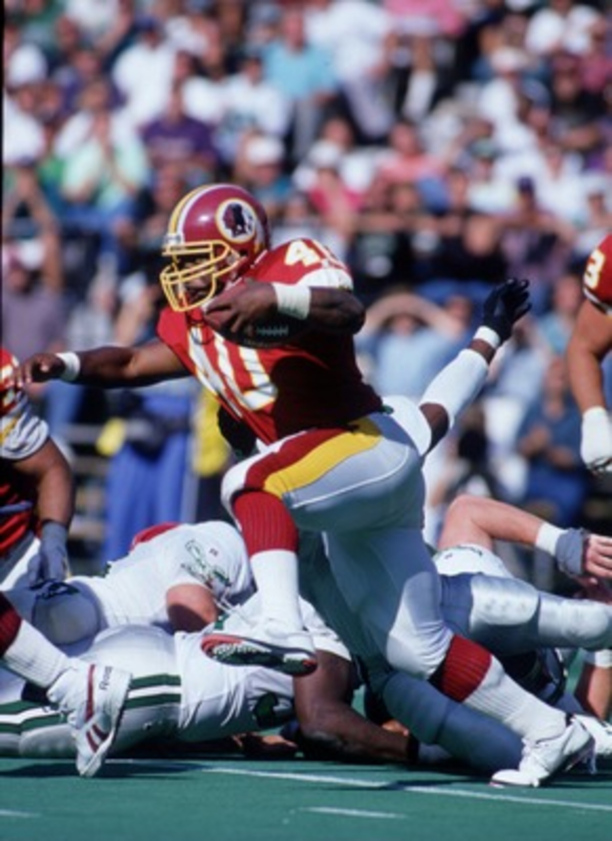 19 Sep 1993: Running back Reggie Brooks carries the football during the Redskins 34-31 loss to the Philadelphia Eagles at RFK Stadium in Washington, D.C.