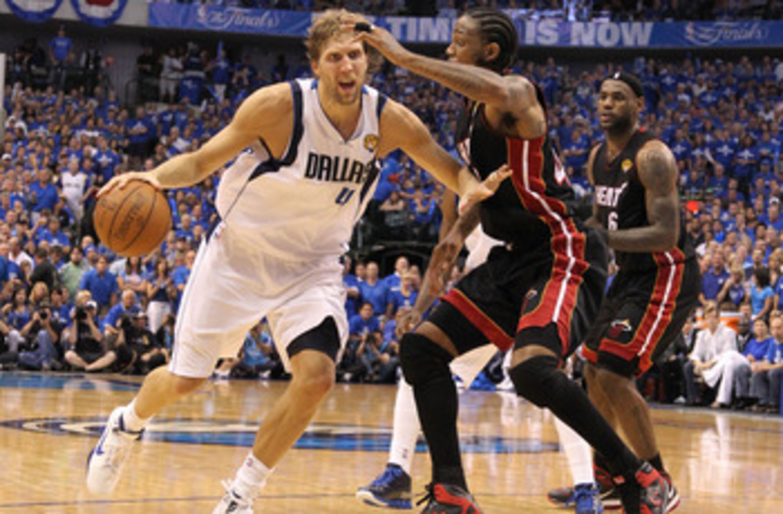 DALLAS, TX - JUNE 09: Dirk Nowitzki #41 of the Dallas Mavericks drives against Udonis Haslem #40 of the Miami Heat in Game Five of the 2011 NBA Finals at American Airlines Center on June 9, 2011 in Dallas, Texas. NOTE TO USER: User expressly acknowledge DALLAS, TX - JUNE 09: Dirk Nowitzki #41 of the Dallas Mavericks drives against Udonis Haslem #40 of the Miami Heat in Game Five of the 2011 NBA Finals at American Airlines Center on June 9, 2011 in Dallas, Texas. NOTE TO USER: User expressly acknowledge