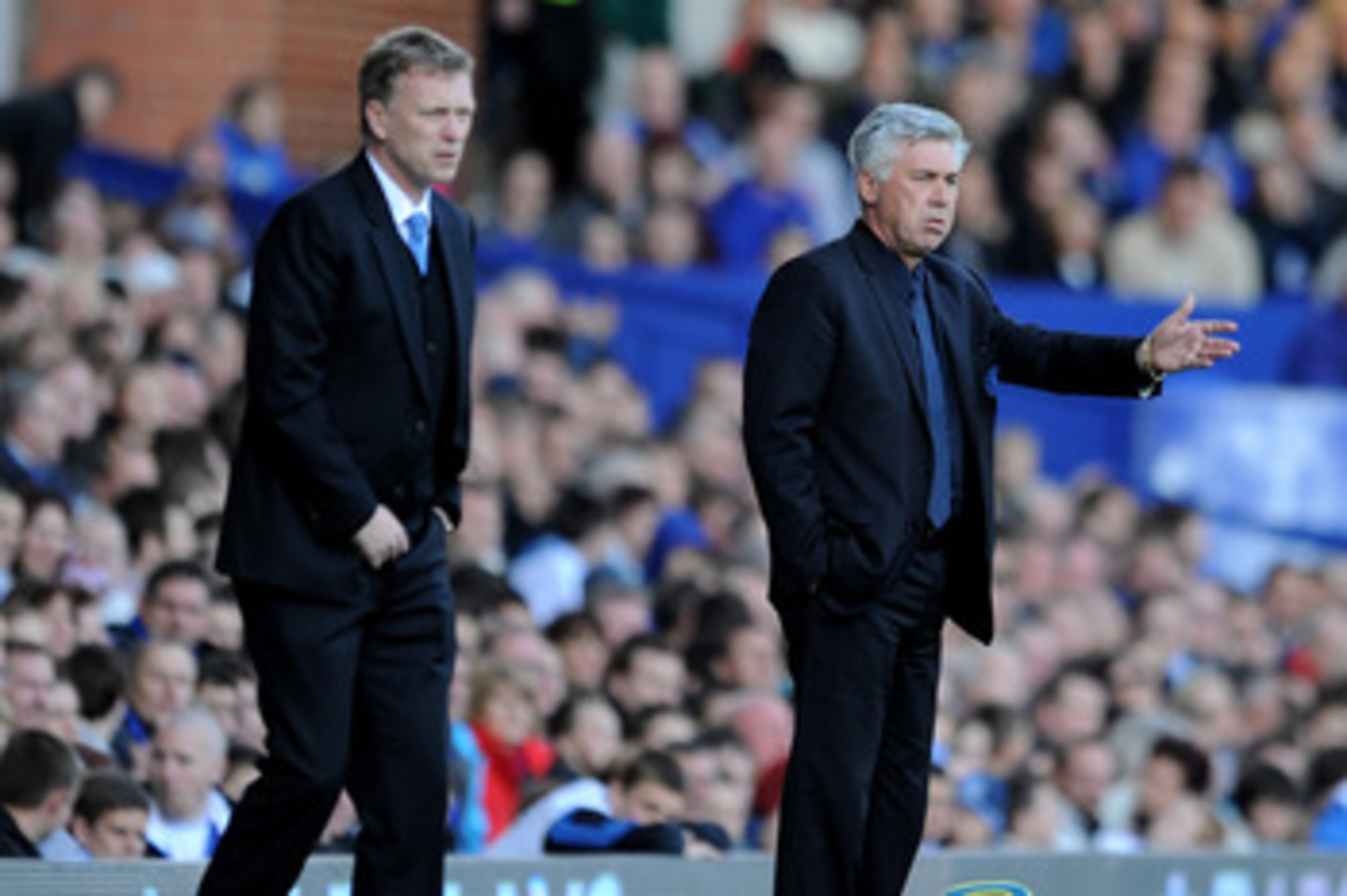LIVERPOOL, ENGLAND - MAY 22:  Chelsea Manager Carlo Ancelotti (R) gestures during the Barclays Premier League match between Everton and Chelsea at Goodison Park on May 22, 2011 in Liverpool, England.  (Photo by Chris Brunskill/Getty Images)