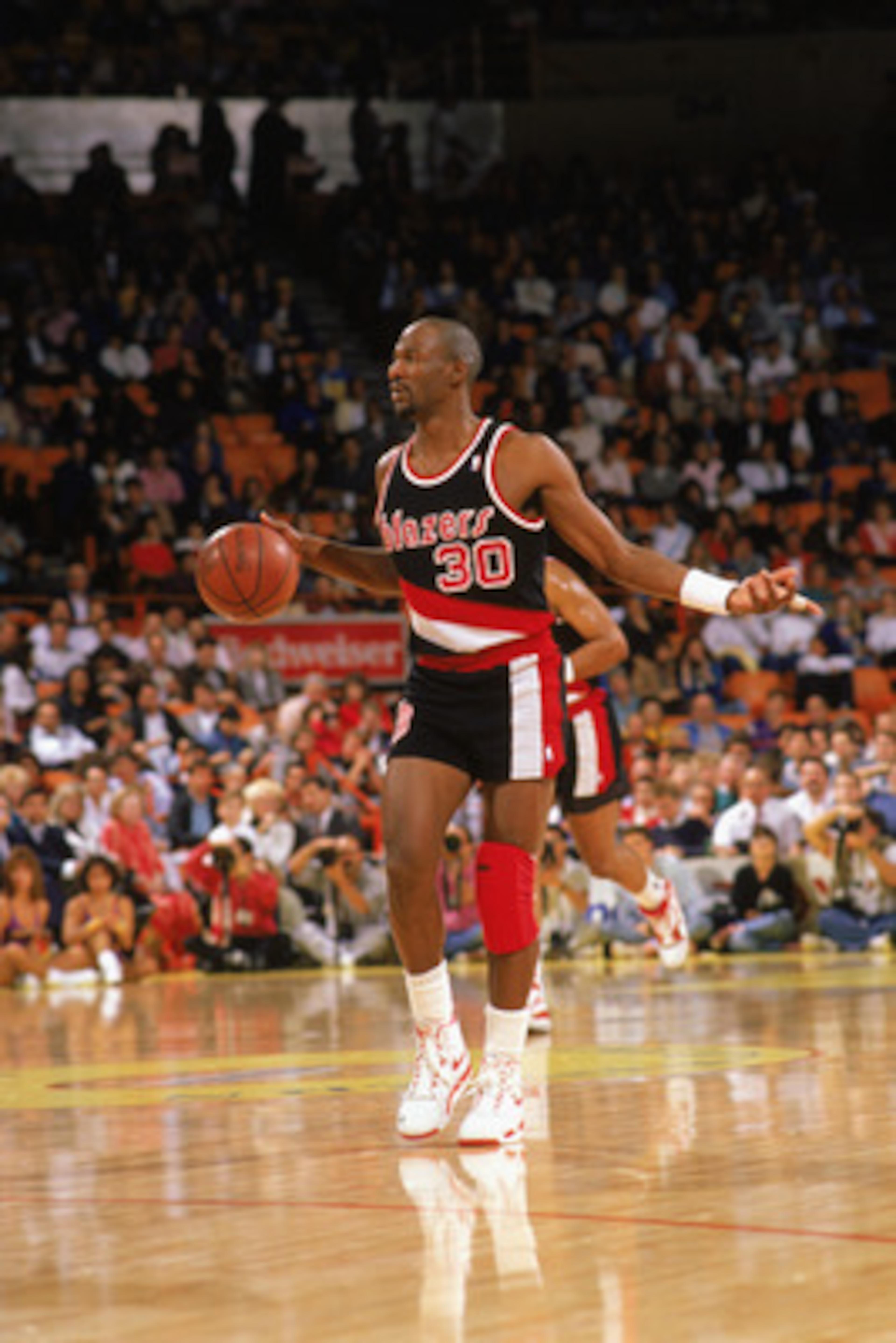 LOS ANGELES - 1990:  Terry Porter #30 of the Portland Trail Blazers moves the ball against the Los Angeles Lakers during the 1989-1990 NBA season game at the Great Western Forum in Los Angeles, California.  (Photo by Mike Powell/Getty Images)