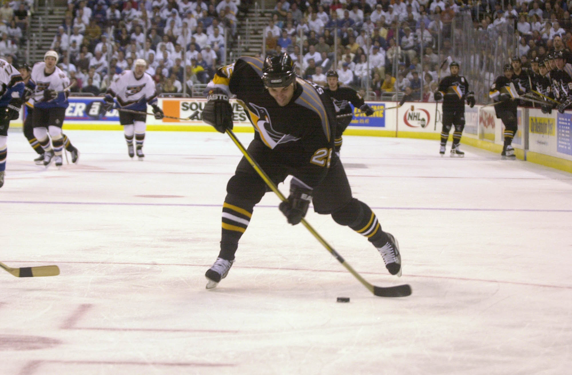 21 Apr 2001 : Kevin Stevens #25 of the Pittsburgh Penguins takes a shot against the Washington Capitals during Game 5 of the Eastern Conference Quarterfinals of the Stanley Cup Playoffs at MCI Center in Washington, DC . The Penguins defeat the Capitals 2-