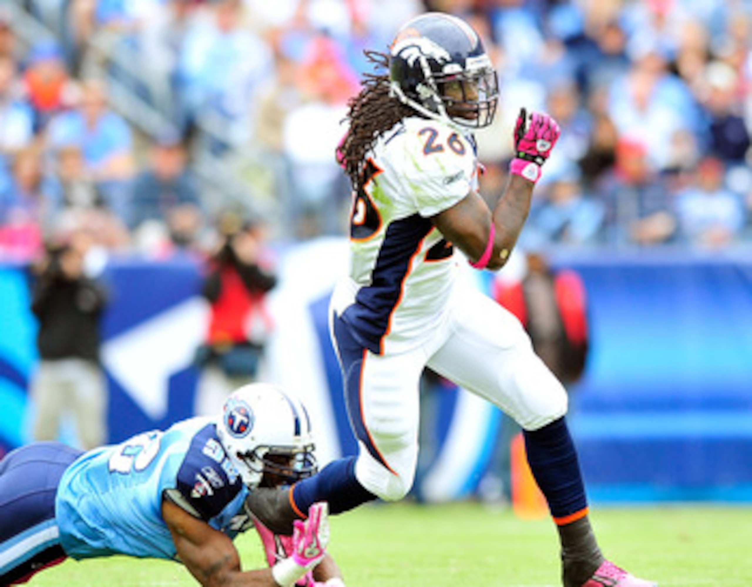 NASHVILLE, TN - OCTOBER 03: Laurence Maroney #26 of the Denver Broncos breaks away from Will Witherspoon #92 of the Tennessee Titans during the first half at LP Field on October 3, 2010 in Nashville, Tennessee. (Photo by Grant Halverson/Getty Images) NASHVILLE, TN - OCTOBER 03: Laurence Maroney #26 of the Denver Broncos breaks away from Will Witherspoon #92 of the Tennessee Titans during the first half at LP Field on October 3, 2010 in Nashville, Tennessee. (Photo by Grant Halverson/Getty Images)