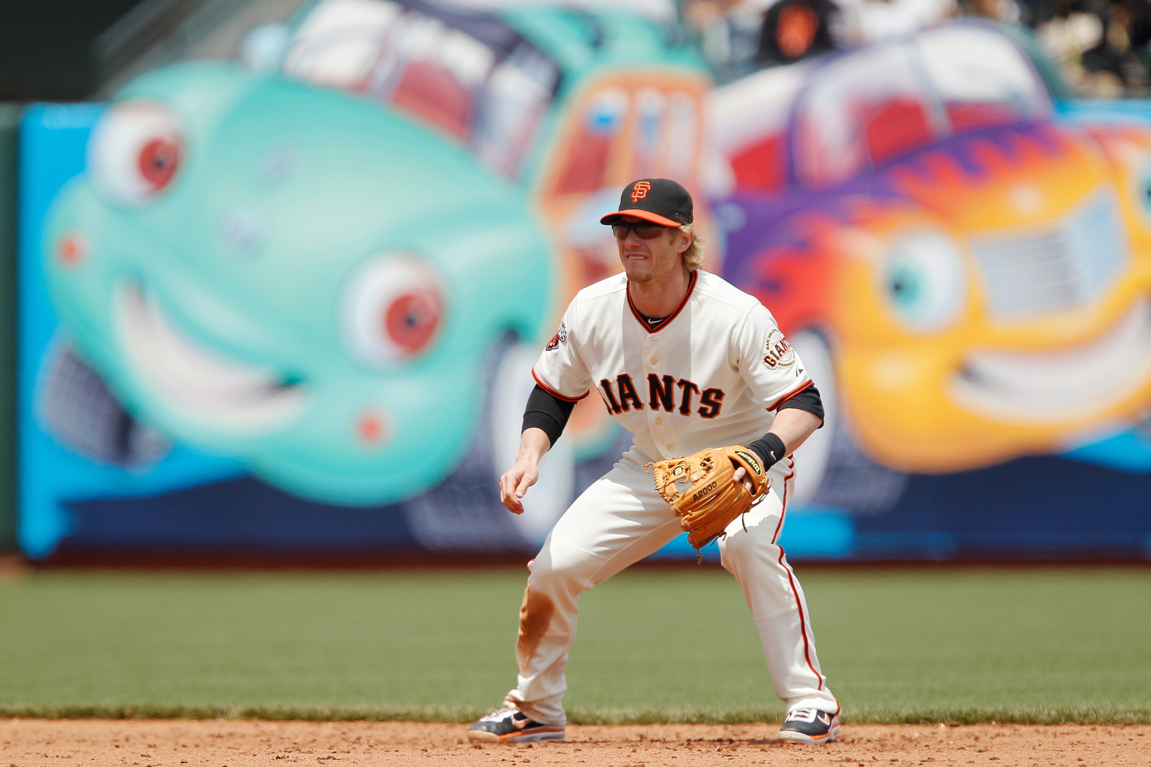 SAN FRANCISCO, CA - MAY 22:  Shortstop Mike Fontenot #14 of the San Francisco Giants stands ready for the throw against the Oakland A's at AT&T Park on May 22, 2011 in San Francisco, California.  The Giants won 5-4 in 11 innings.  (Photo by Brian Bahr/Get