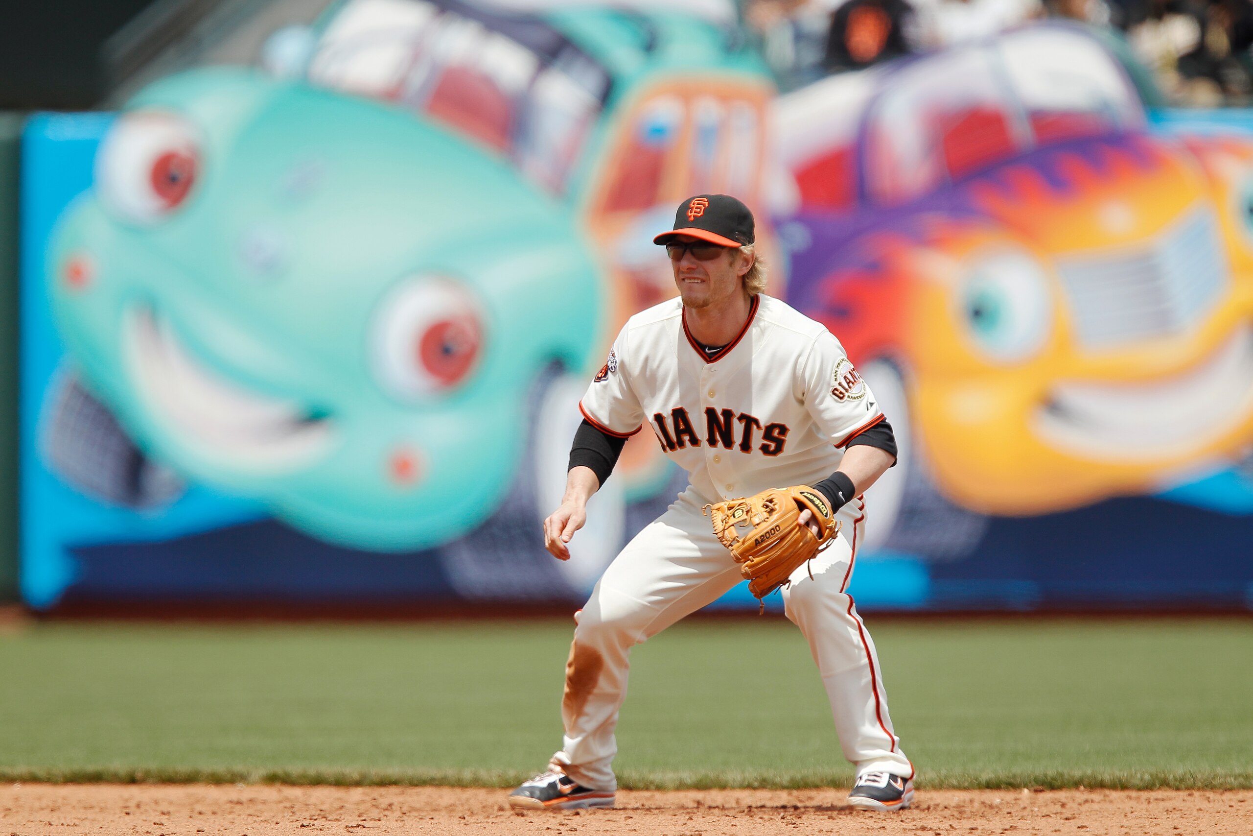 SAN FRANCISCO, CA - MAY 22:  Shortstop Mike Fontenot #14 of the San Francisco Giants stands ready for the throw against the Oakland A's at AT&T Park on May 22, 2011 in San Francisco, California.  The Giants won 5-4 in 11 innings.  (Photo by Brian Bahr/Get