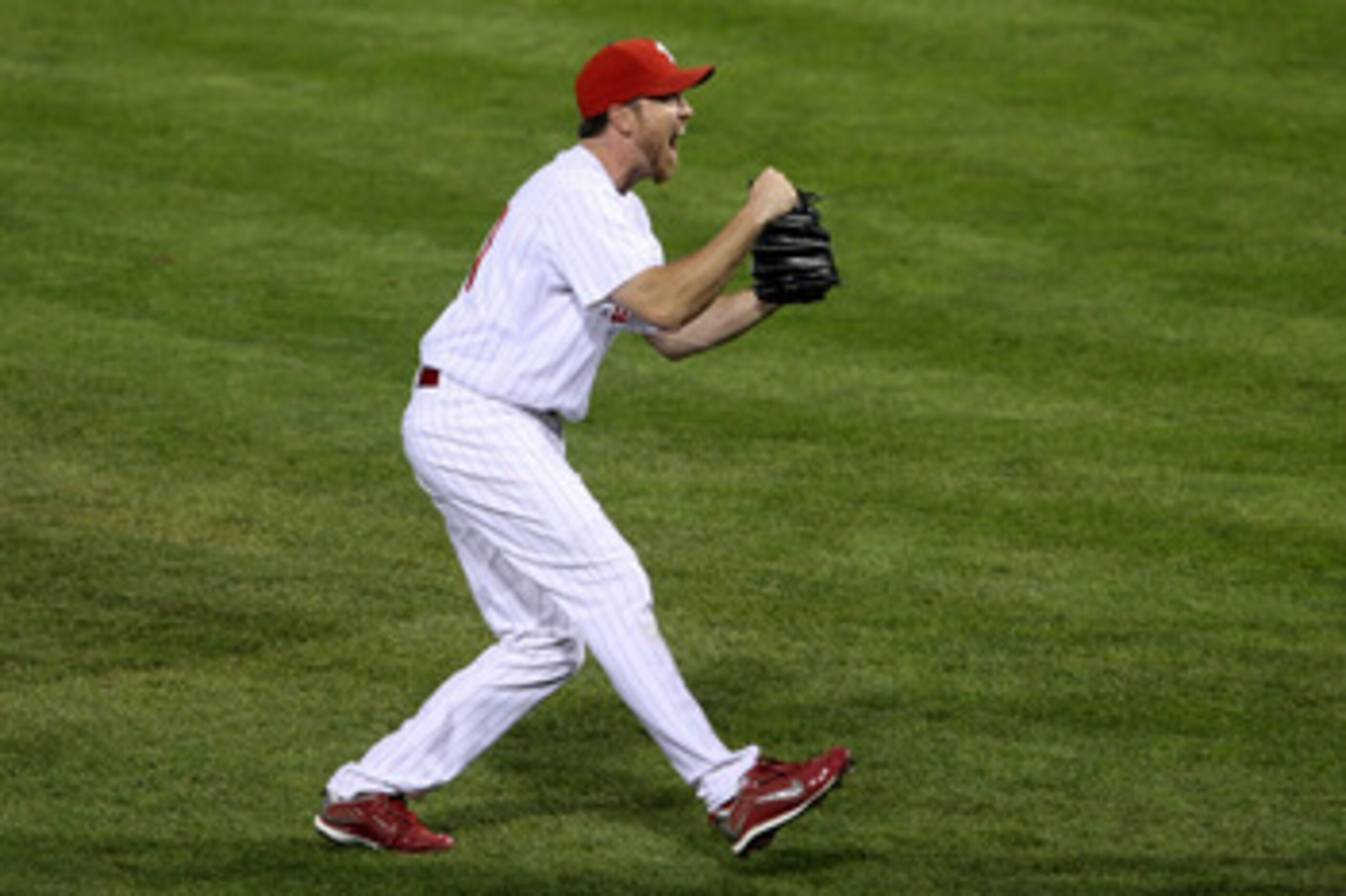 PHILADELPHIA - OCTOBER 21:  Brad Lidge #54 of the Philadelphia Phillies celebrates defeating the Los Angeles Dodgers 10-4 to advance to the World Series in Game Five of the NLCS during the 2009 MLB Playoffs at Citizens Bank Park on October 21, 2009 in Phi