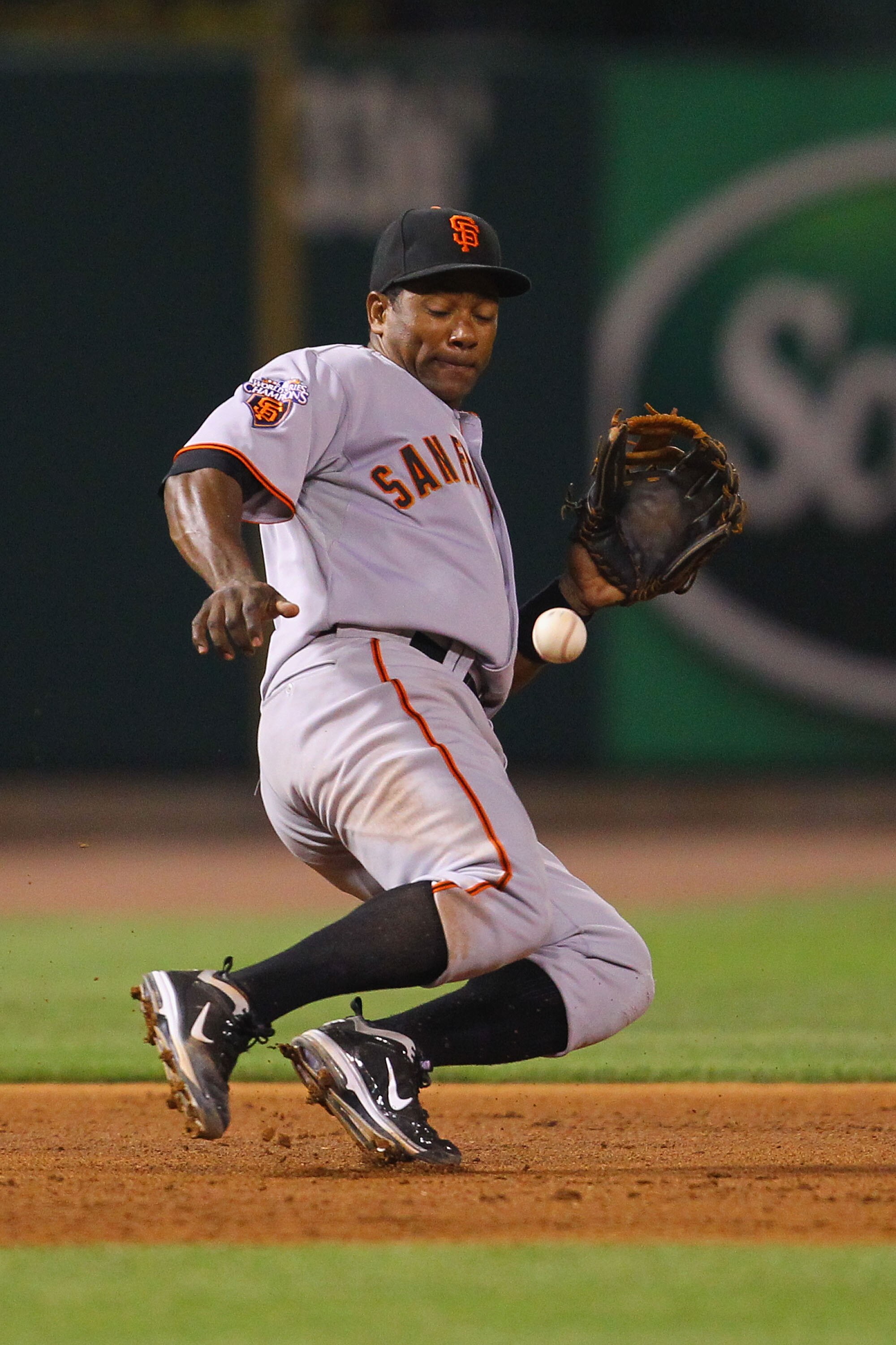 ST. LOUIS, MO - MAY 31: Miguel Tejada #10 of the San Francisco Giants misplays a one hopper against the St. Louis Cardinals at Busch Stadium on May 31, 2011 in St. Louis, Missouri.  (Photo by Dilip Vishwanat/Getty Images)