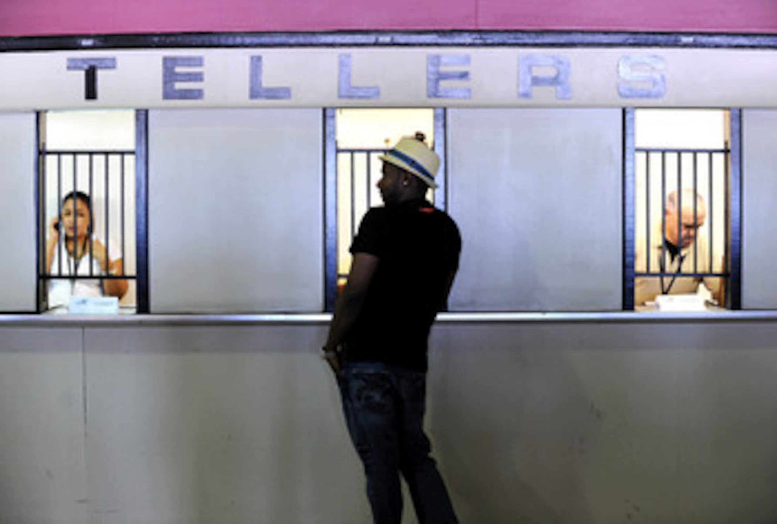 BALTIMORE - MAY 21: A man places a bet prior to the 136th running of the Preakness Stakes at Pimlico Race Course on May 21, 2011 in Baltimore, Maryland. (Photo by Patrick Smith/Getty Images)