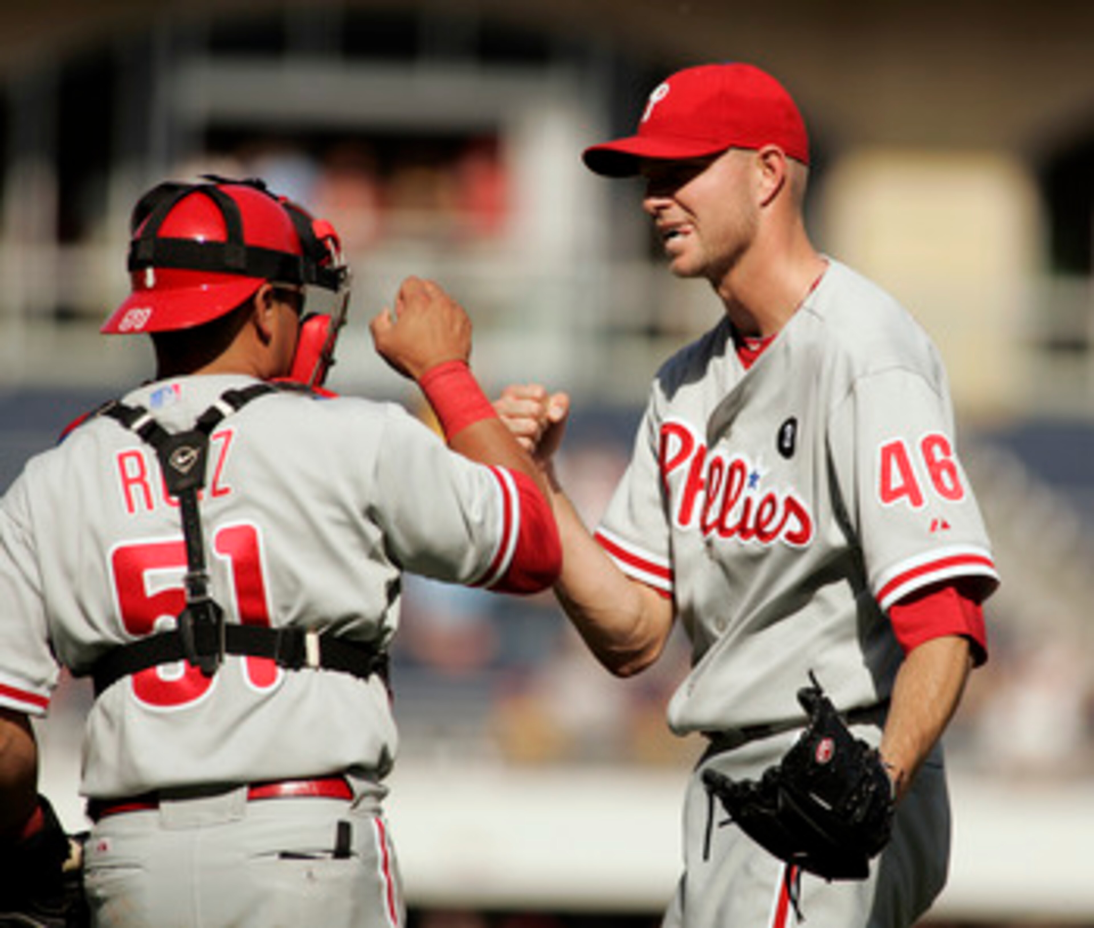 PITTSBURGH, PA - JUNE 05:  Ryan Madson #46 and Carlos Ruiz #51 of the Philadelphia Phillies celebrate the win over the Pittsburgh Pirates  on June 5, 2011 at PNC Park in Pittsburgh, Pennsylvania.  Phillies defeated the Pirates 7-3.  (Photo by Justin K. Al