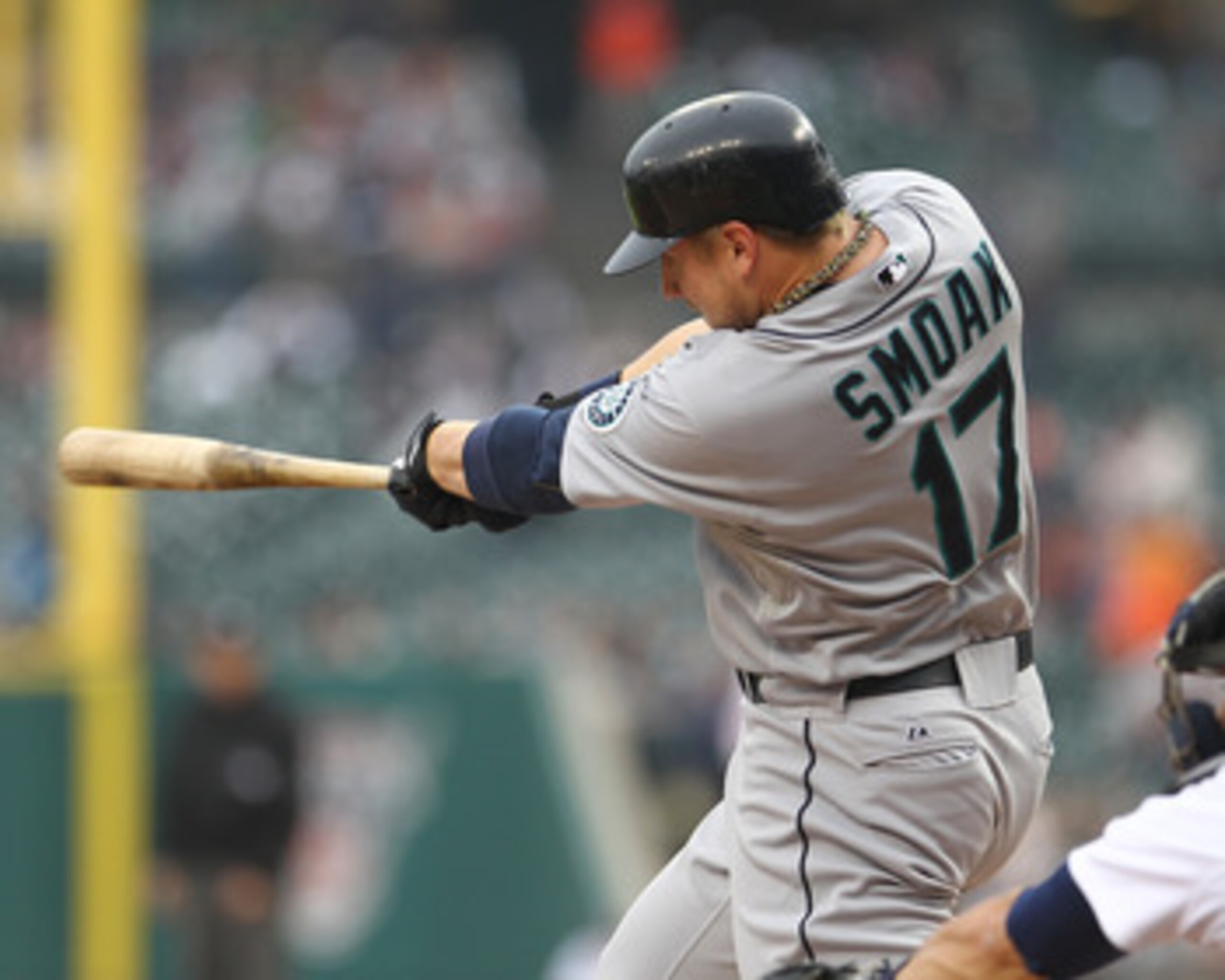 DETROIT, MI - JUNE 10:  First Baseman Justin Smoak #17 of the Seattle Mariners hits a solo home run in the first inning during a MLB game against the Detroit Tigers at Comerica Park on June 10, 2011 in Detroit, Michigan.  Seattle defeated Detroit 3-2.  (P