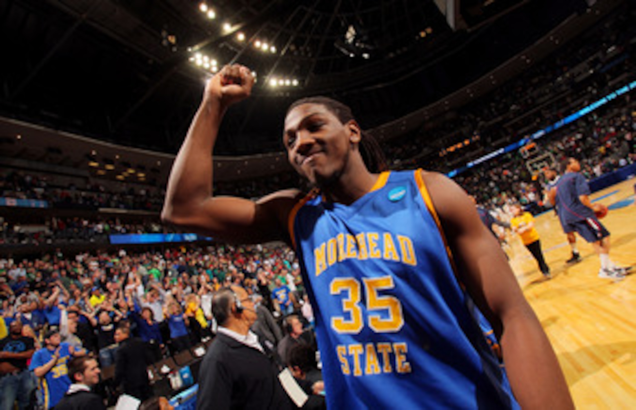 DENVER, CO - MARCH 17:  Kenneth Faried #35 of the Morehead State Eagles celebrates after defeating the Louisville Cardinals during the second round of the 2011 NCAA men's basketball tournament at Pepsi Center on March 17, 2011 in Denver, Colorado. The Mor