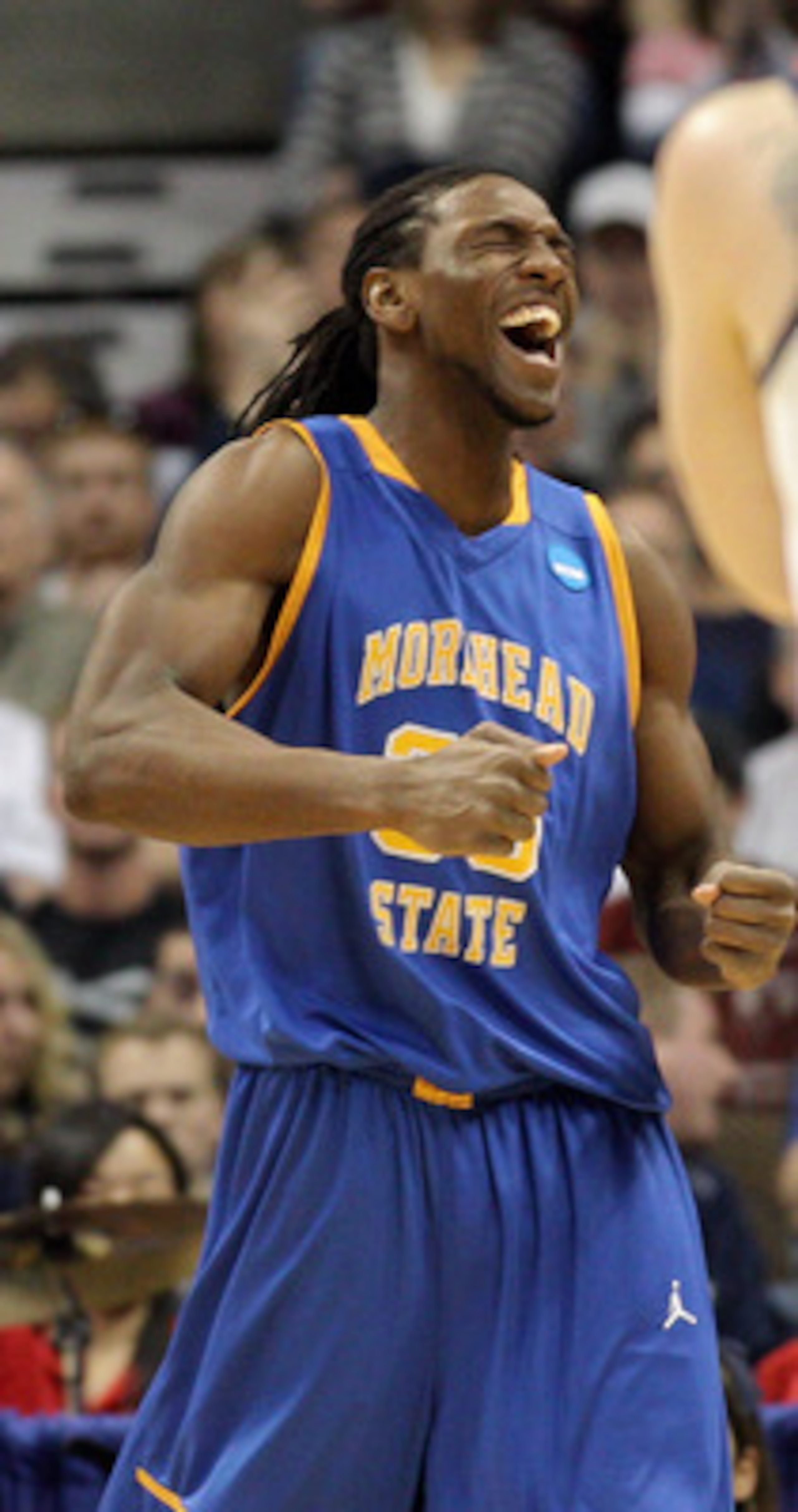 DENVER, CO - MARCH 19:  Kenneth Faried #35 of the Morehead State Eagles dunks reacts after a play against the Richmond Spiders during the third round of the 2011 NCAA men's basketball tournament at Pepsi Center on March 19, 2011 in Denver, Colorado.  (Pho