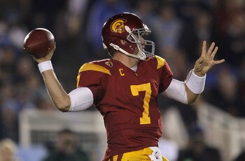 PASADENA, CA - DECEMBER 04:  Quarterback Matt Barkley #7 of the USC Trojans drops back to pass against the UCLA Bruins during the first half at the Rose Bowl on December 4, 2010 in Pasadena, California.  (Photo by Jeff Gross/Getty Images)