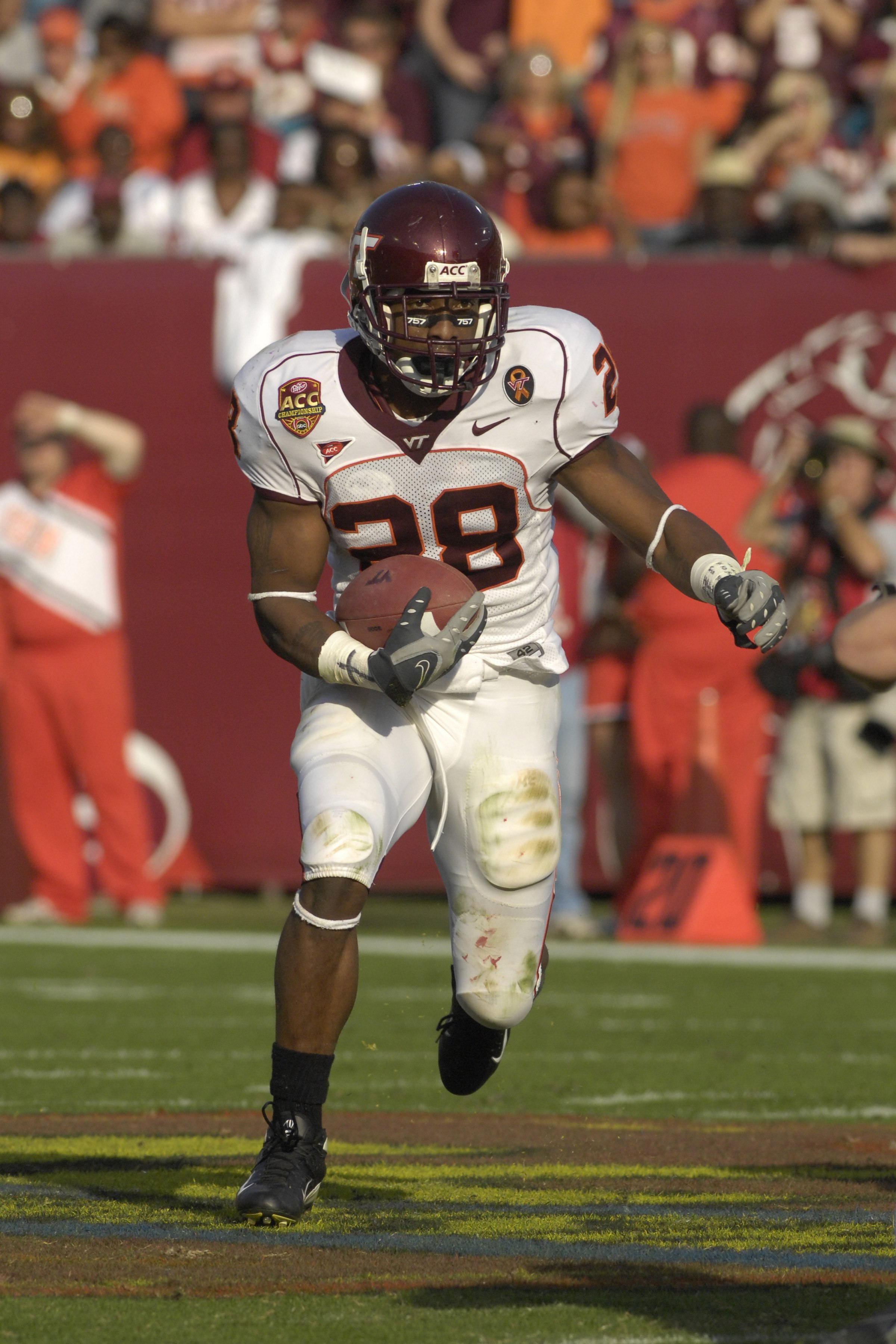 JACKSONVILLE, FL - DECEMBER 1: Running back Branden Ore #28  of the Virginia Tech Hokies rushes upfield against the Boston College Eagles in the ACC Championship Game at Jacksonville Municipal Stadium on December 1, 2007 in Jacksonville, Florida.  The Hok