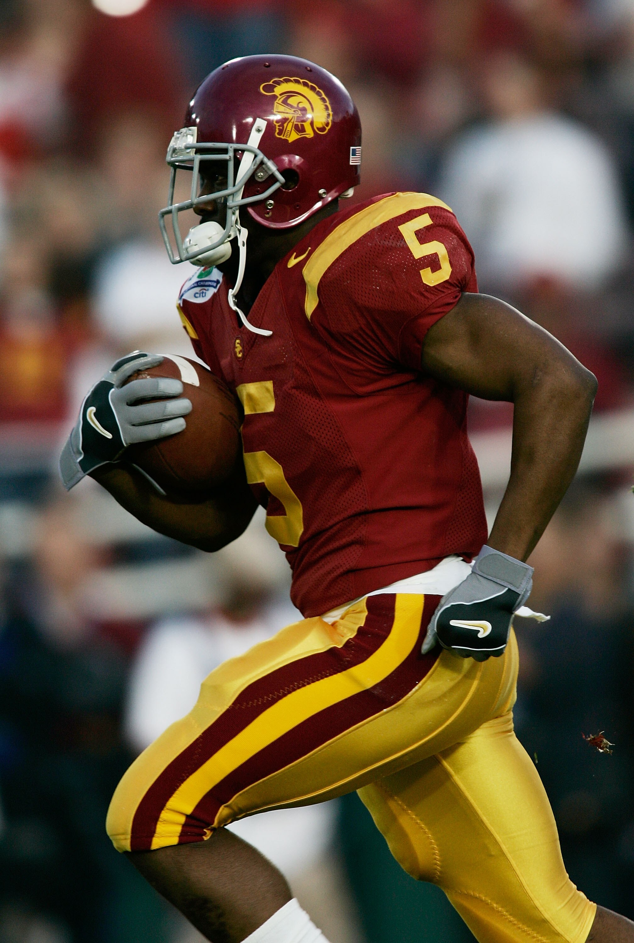 PASADENA, CA - JANUARY 04:  Running back Reggie Bush #5 of the USC Trojans warms-up before the start of the BCS National Championship Rose Bowl Game against the Texas Longhorns on January 4, 2006 in Pasadena, California.  (Photo by Donald Miralle/Getty Im