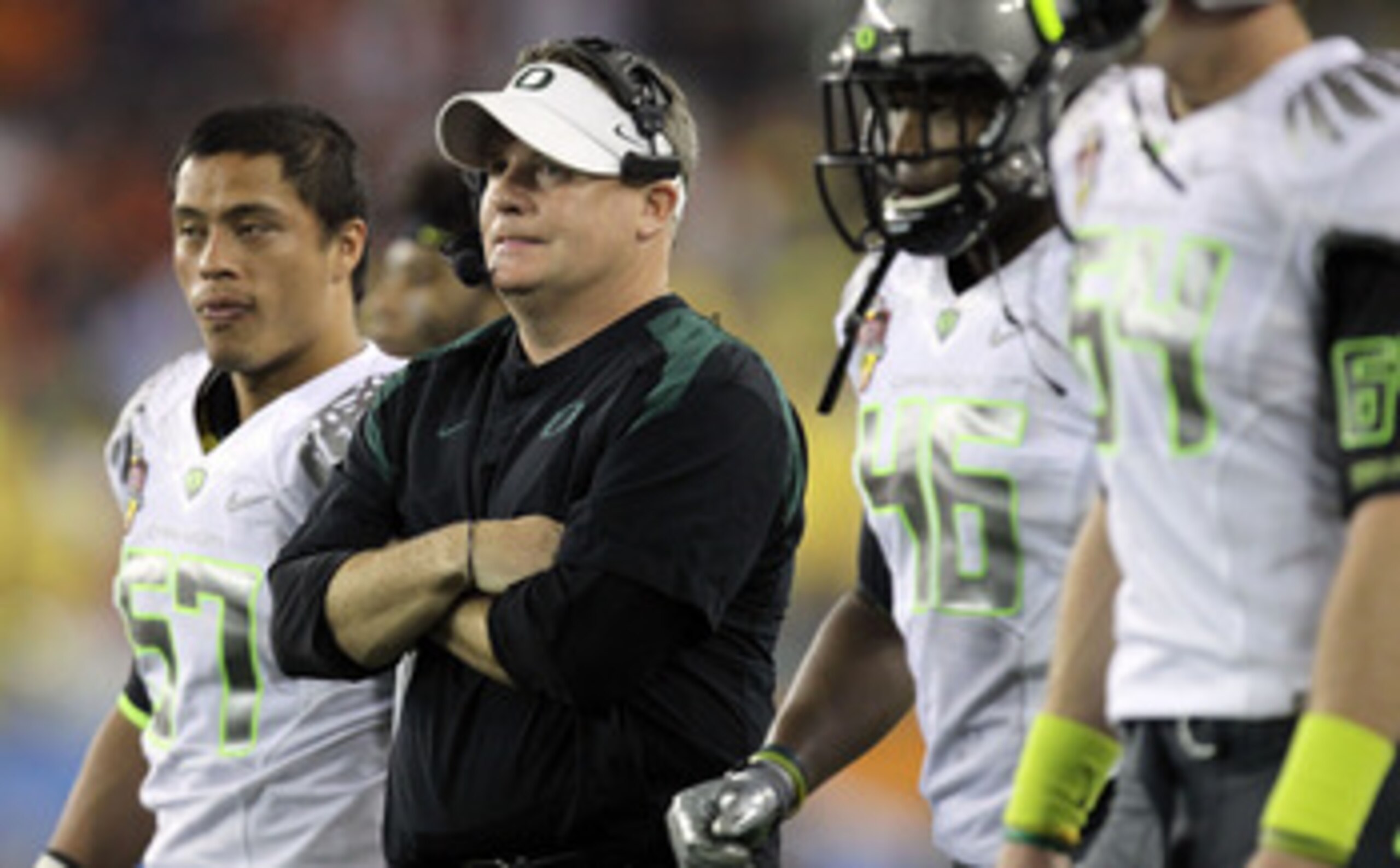 GLENDALE, AZ - JANUARY 10:  Head coach Chip Kelly of the Oregon Ducks looks on against the Auburn Tigers in the Tostitos BCS National Championship Game at University of Phoenix Stadium on January 10, 2011 in Glendale, Arizona.  (Photo by Ronald Martinez/G