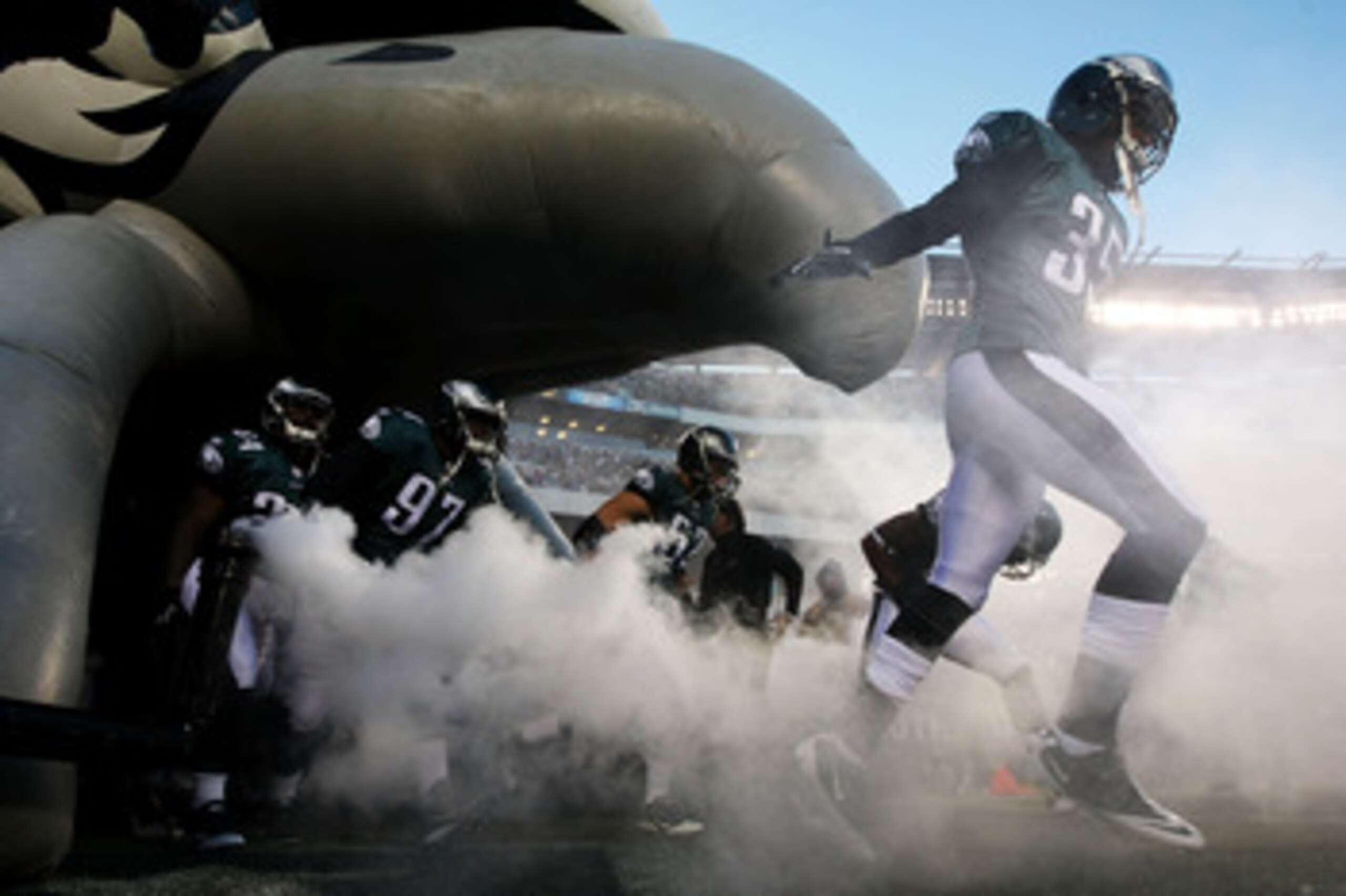 PHILADELPHIA, PA - JANUARY 09:  Trevard Lindley #35 of the Philadelphia Eagles and his teammates take the field before playing against the Green Bay Packers in the 2011 NFC wild card playoff game at Lincoln Financial Field on January 9, 2011 in Philadelph