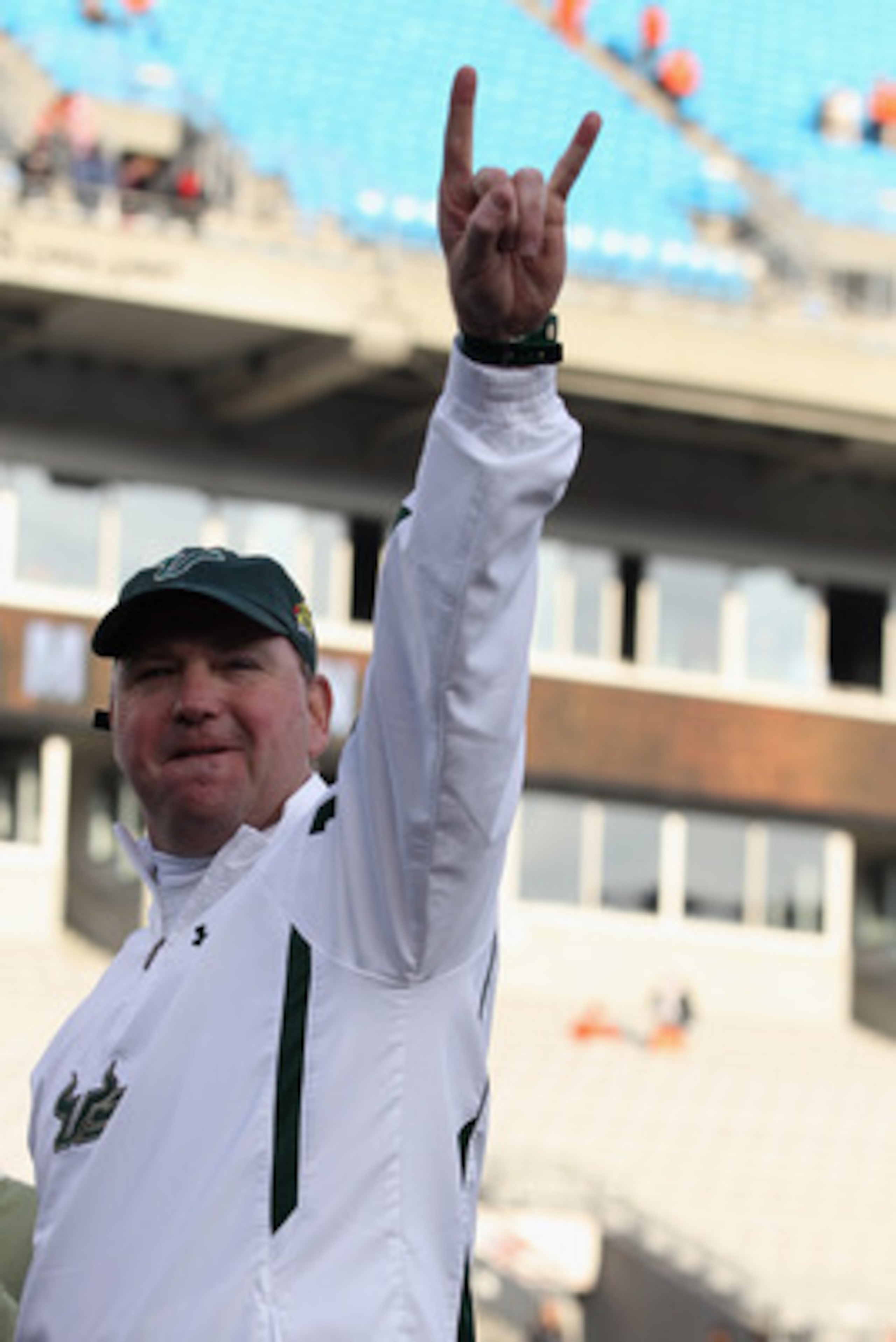 CHARLOTTE, NC - DECEMBER 31:  Head coach Skip Holtz of the USF Bulls celebrates after a 31-26 victory over the Clemson Tigers at Bank of America Stadium on December 31, 2010 in Charlotte, North Carolina.  (Photo by Streeter Lecka/Getty Images)