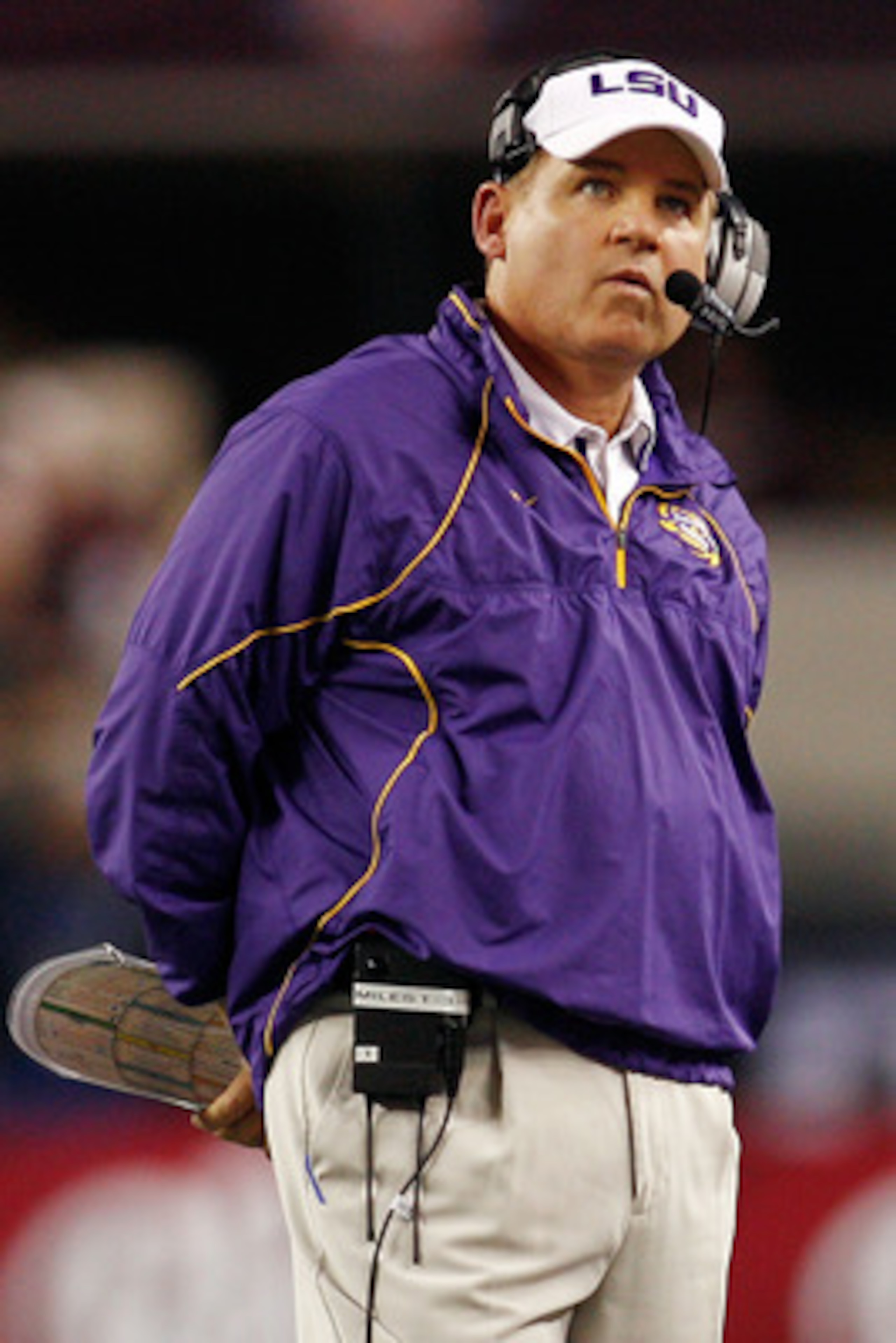 ARLINGTON, TX - JANUARY 07:  Head coach Les Miles of the Louisiana State University Tigers watches the score board during a timeout against the Texas A&M Aggies during the AT&T Cotton Bowl at Cowboys Stadium on January 7, 2011 in Arlington, Texas.  (Photo