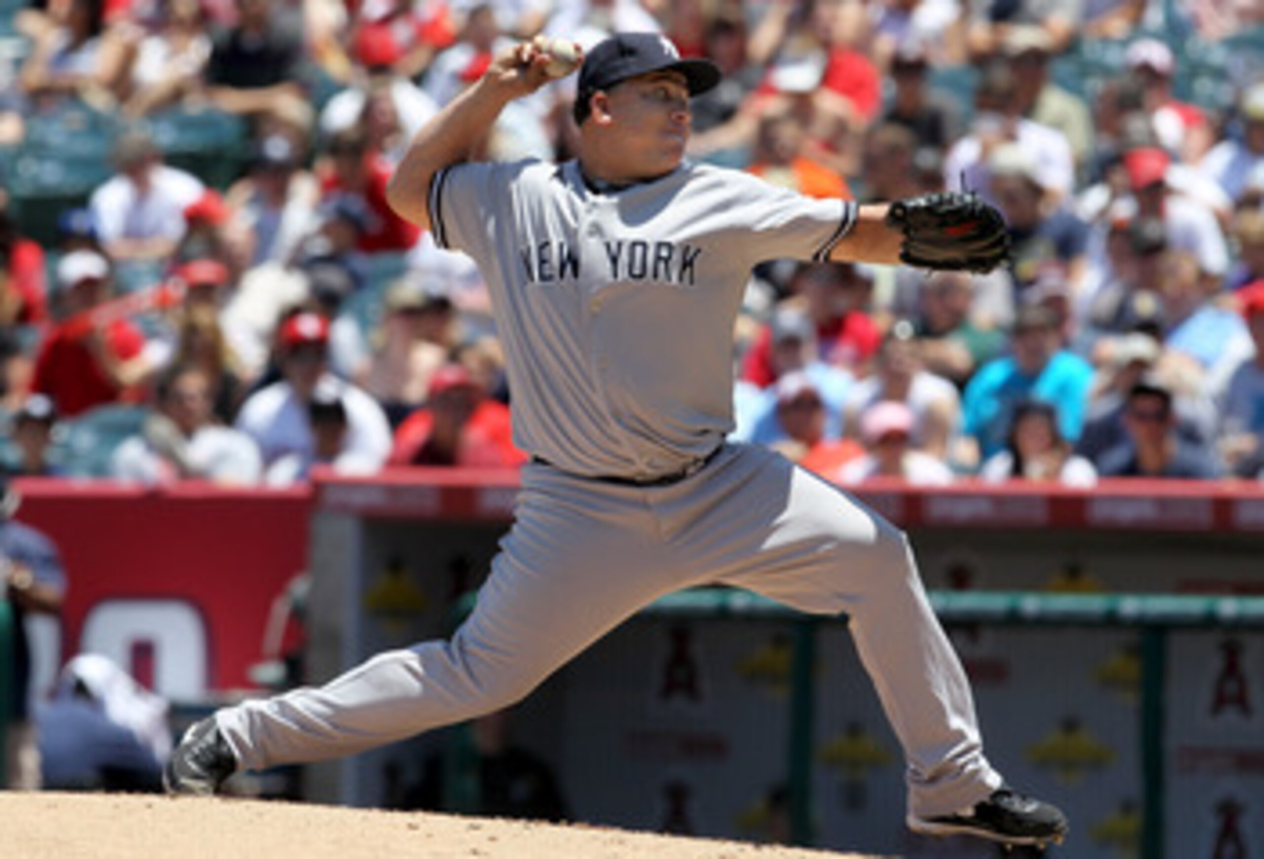 ANAHEIM, CA - JUNE 05: Bartolo Colon #40 of the New York Yankees throws a pitch against the Los Angeles Angels of Anaheim on June 5, 2011 at Angel Stadium in Anaheim, California. The Yankees won 5-3. (Photo by Stephen Dunn/Getty Images) ANAHEIM, CA - JUNE 05: Bartolo Colon #40 of the New York Yankees throws a pitch against the Los Angeles Angels of Anaheim on June 5, 2011 at Angel Stadium in Anaheim, California. The Yankees won 5-3. (Photo by Stephen Dunn/Getty Images)