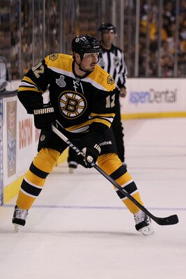 BOSTON, MA - JUNE 06:  Tomas Kaberle #12 of the Boston Bruins skates against of the Vancouver Canucks during Game Three of the 2011 NHL Stanley Cup Final at TD Garden on June 6, 2011 in Boston, Massachusetts.  (Photo by Elsa/Getty Images)