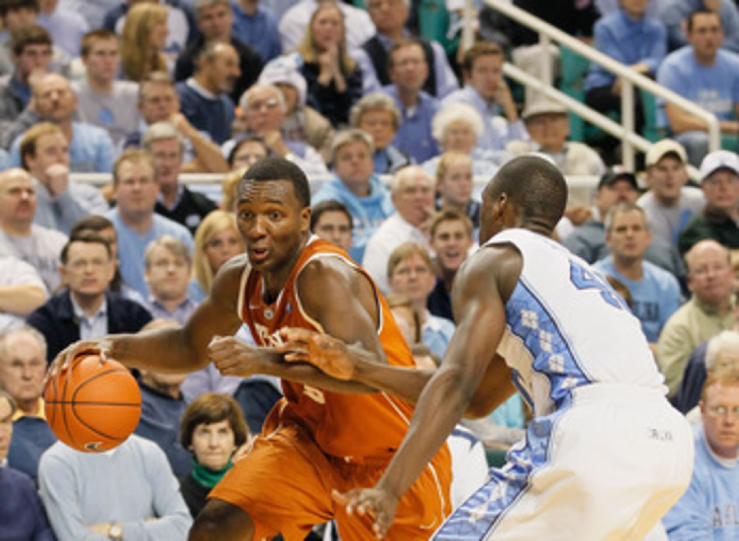 GREENSBORO, NC - DECEMBER 18:  Jordan Hamilton #3 of the Texas Longhorns against Harrison Barnes #40 of the North Carolina Tar Heels at Greensboro Coliseum on December 18, 2010 in Greensboro, North Carolina.  (Photo by Kevin C. Cox/Getty Images)