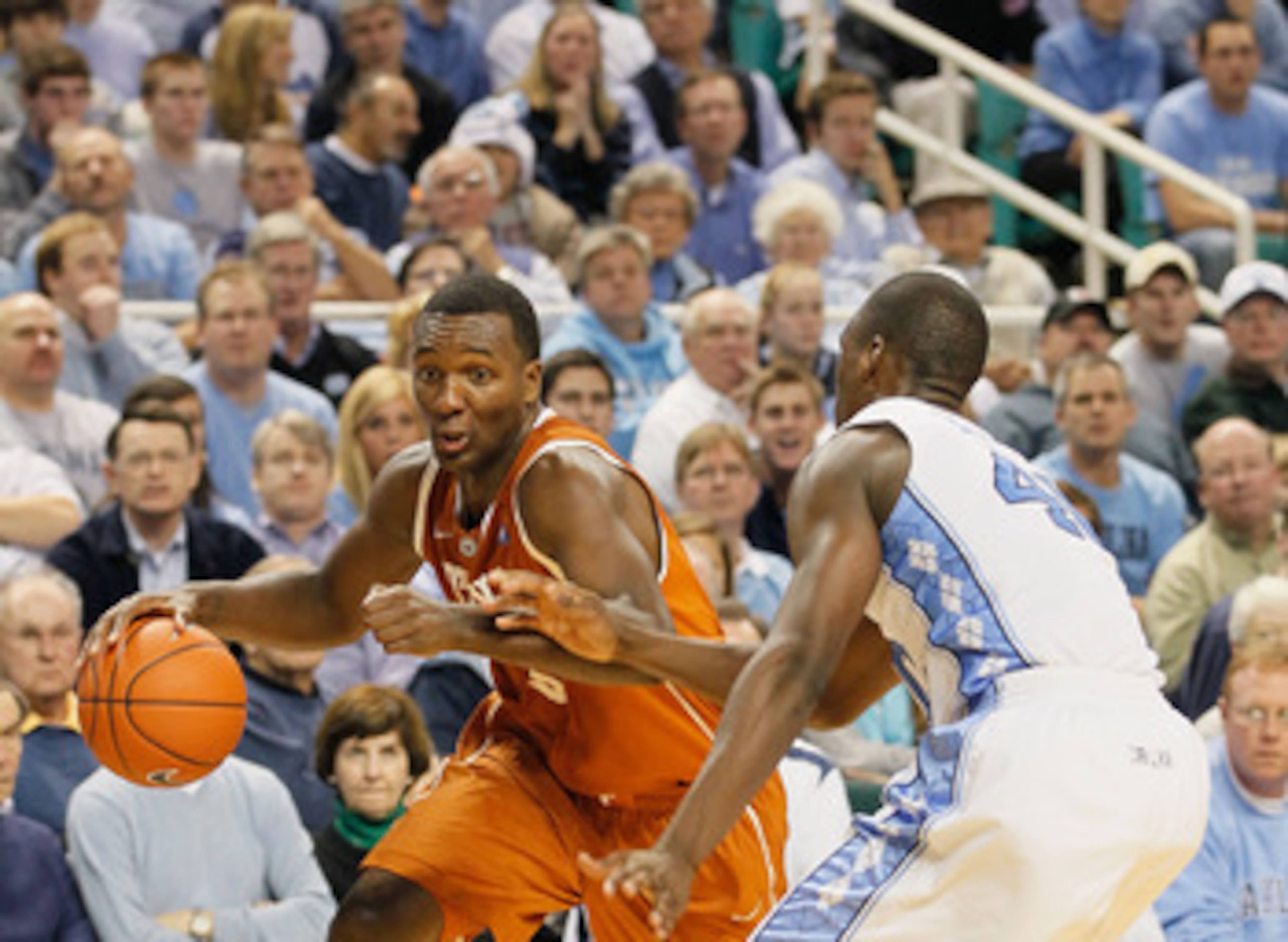 GREENSBORO, NC - DECEMBER 18:  Jordan Hamilton #3 of the Texas Longhorns against Harrison Barnes #40 of the North Carolina Tar Heels at Greensboro Coliseum on December 18, 2010 in Greensboro, North Carolina.  (Photo by Kevin C. Cox/Getty Images)