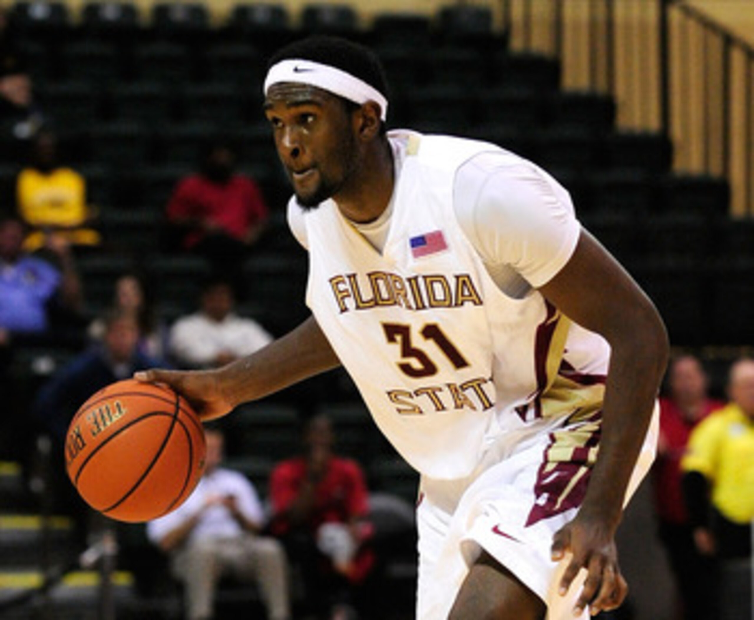 ORLANDO, FL - NOVEMBER 27:  Chris Singleton #31 of the Florida State Seminoles looks to pass against the Alabama Crimson Tide during the Old Spice Classic at Disney's Milk House on November 27, 2009 in Orlando, Florida.  (Photo by Sam Greenwood/Getty Imag