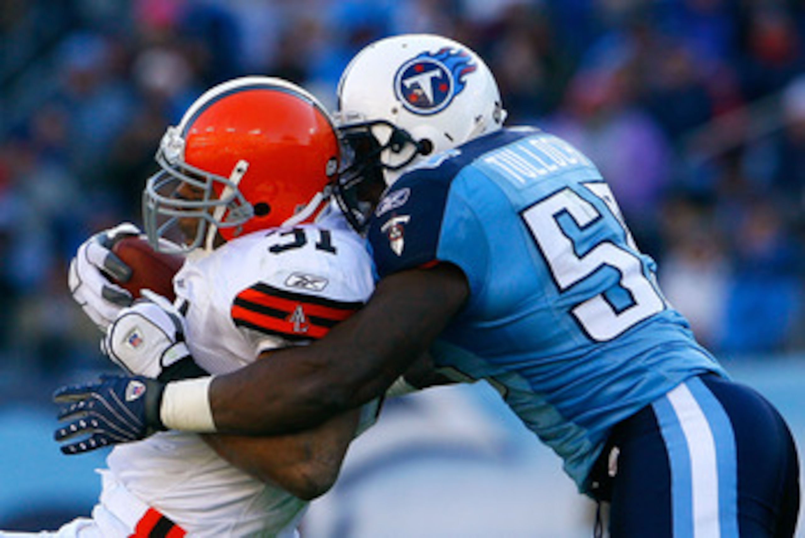 NASHVILLE, TN - DECEMBER 07:  Stephen Tulloch #55 of the Tennessee Titans tackles running back Jamal Lewis #31 of the Cleveland Browns during the game on December 7, 2008 at LP Field in Nashville, Tennessee.  (Photo by Kevin C. Cox/Getty Images)