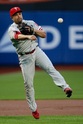NEW YORK, NY - MAY 28: Placido Polanco #27 of the Philadelphia Phillies throws to first base against the New York Mets at Citi Field on May 28, 2011 in the Flushing neighborhood of the Queens borough of New York City. (Photo by Chris Trotman/Getty Images)