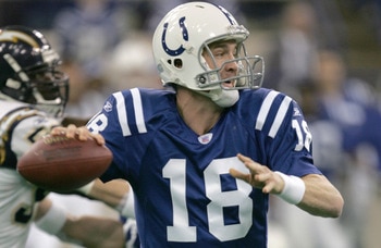 INDIANAPOLIS - DECEMBER 26:  Quarterback Peyton Manning #18 of the Indianapolis Colts snaps back to pass during a game against the San Diego Chargers at the RCA Dome in Indianapolis, Indiana. The Colts defeated the Chargers 34-31 in overtime.  (Photo by J
