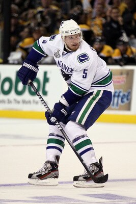 BOSTON, MA - JUNE 06:  Christian Ehrhoff #5 of the Vancouver Canucks skates against the Boston Bruins during Game Three of the 2011 NHL Stanley Cup Final at TD Garden on June 6, 2011 in Boston, Massachusetts.  (Photo by Elsa/Getty Images)