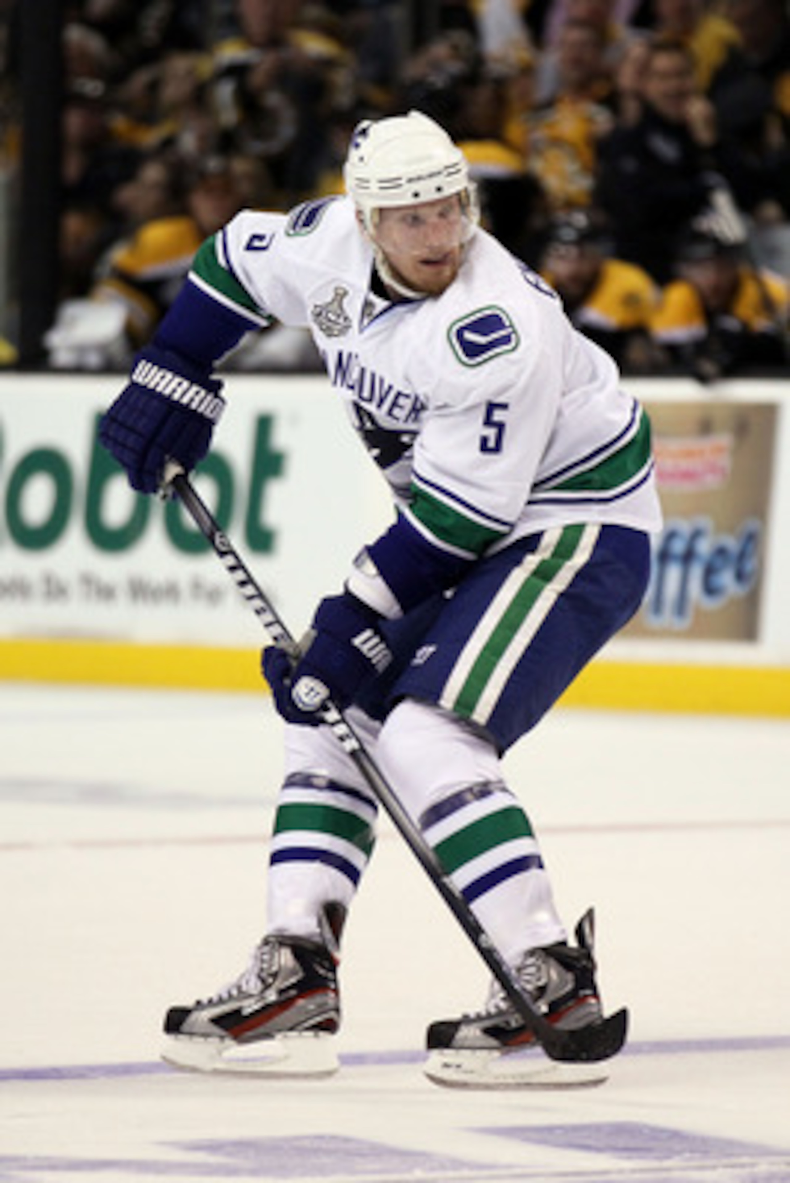 BOSTON, MA - JUNE 06:  Christian Ehrhoff #5 of the Vancouver Canucks skates against the Boston Bruins during Game Three of the 2011 NHL Stanley Cup Final at TD Garden on June 6, 2011 in Boston, Massachusetts.  (Photo by Elsa/Getty Images)