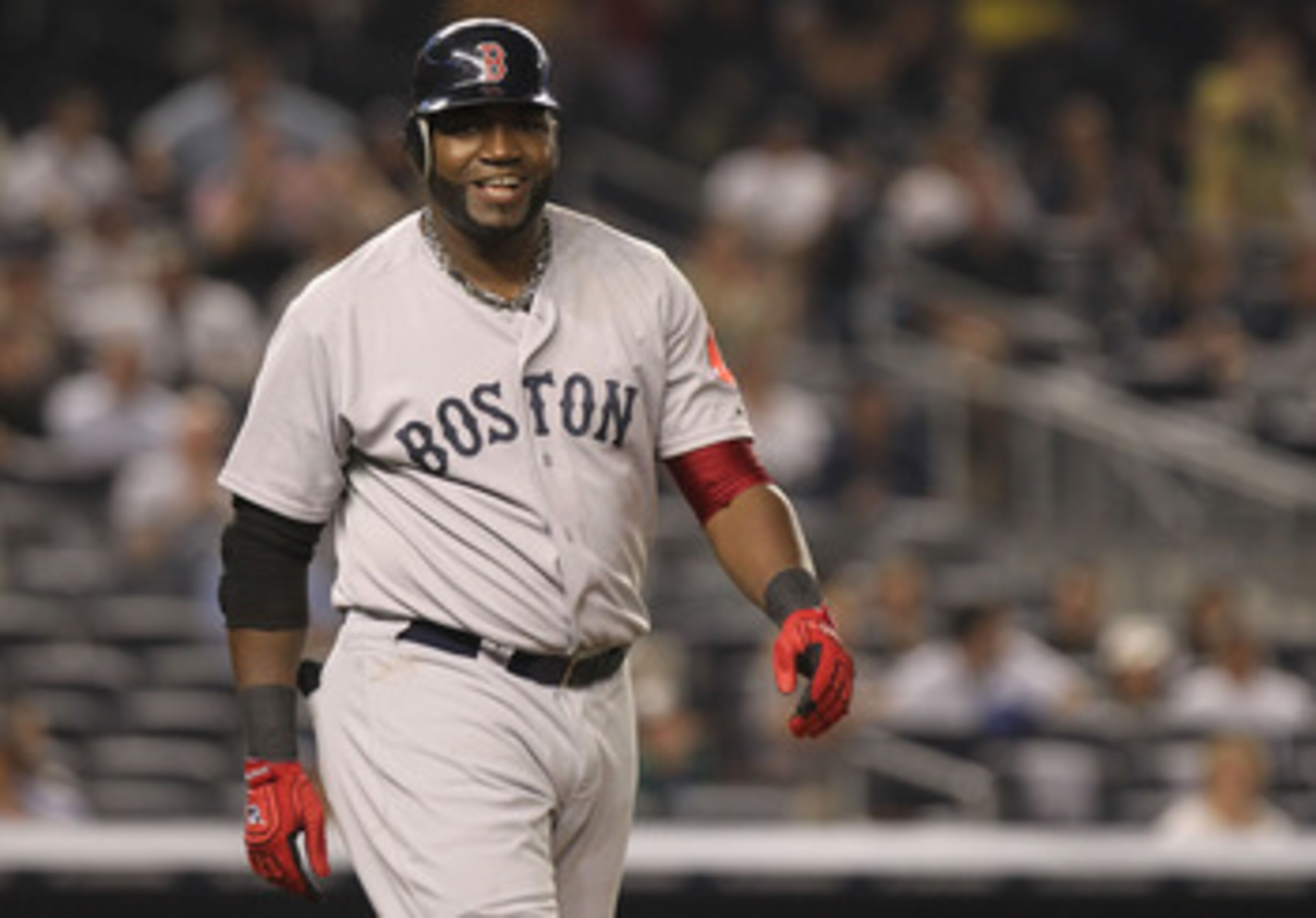 NEW YORK, NY - JUNE 09: David Ortiz #34 of the Boston Red Sox smiles after he walks to first after being hit by a pitch against the New York Yankees on June 9, 2011 at Yankee Stadium in the Bronx borough of New York City. (Photo by Nick Laham/Getty Imag NEW YORK, NY - JUNE 09: David Ortiz #34 of the Boston Red Sox smiles after he walks to first after being hit by a pitch against the New York Yankees on June 9, 2011 at Yankee Stadium in the Bronx borough of New York City. (Photo by Nick Laham/Getty Imag