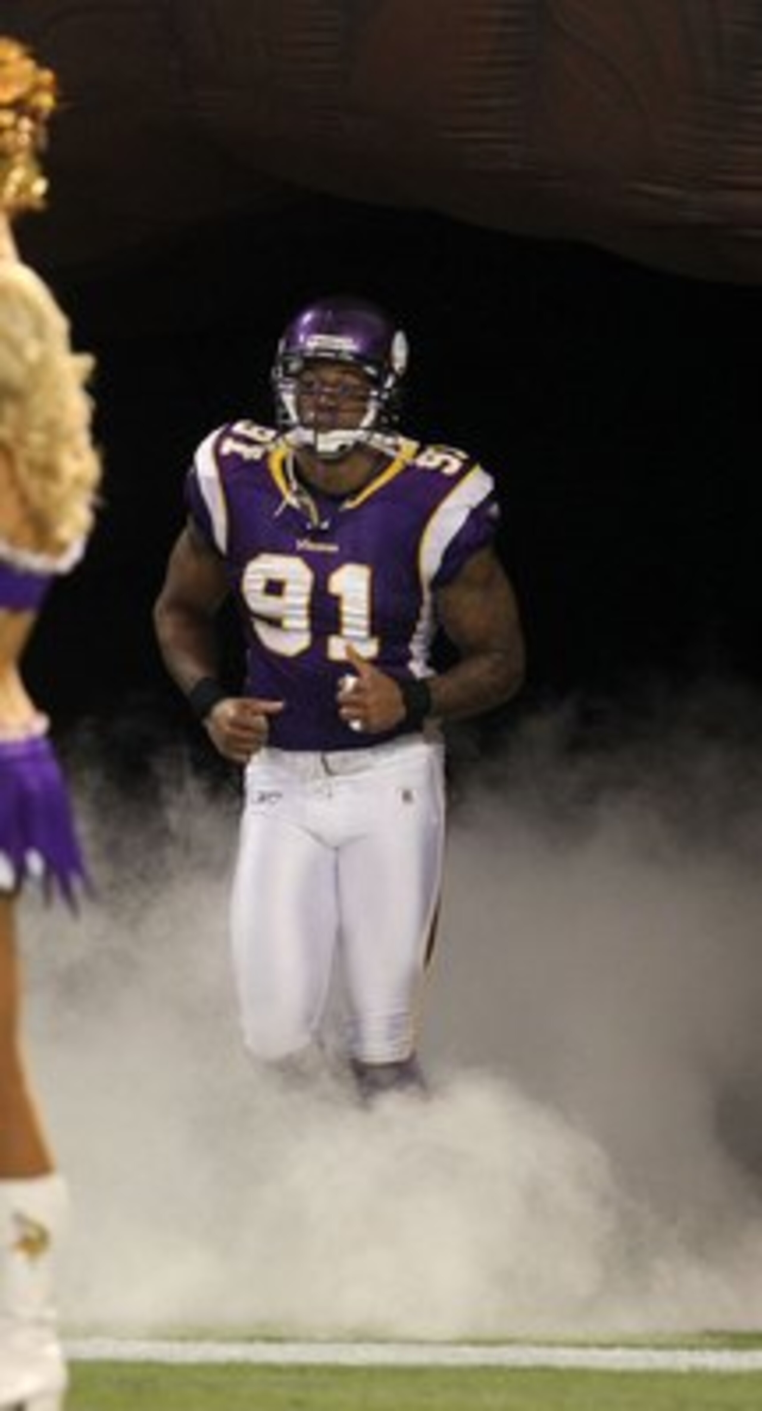 MINNEAPOLIS - JANUARY 17:  Defensive end Ray Edwards #91 of the Minnesota Vikings enters the field before the game against the Dallas Cowboys during the NFC Divisional Playoff Game at Hubert H. Humphrey Metrodome on January 17, 2010 in Minneapolis, Minnes